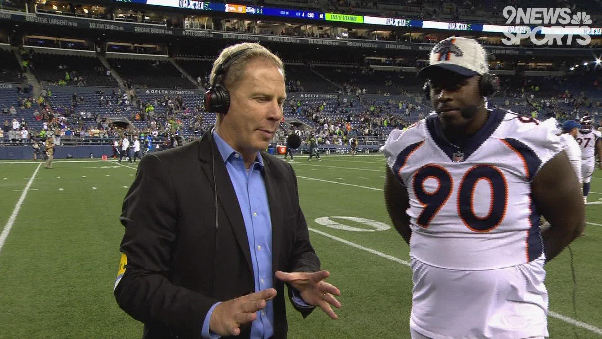 Williams had a fumble recovery and an interception in Denver's 30-3 win over Seattle.