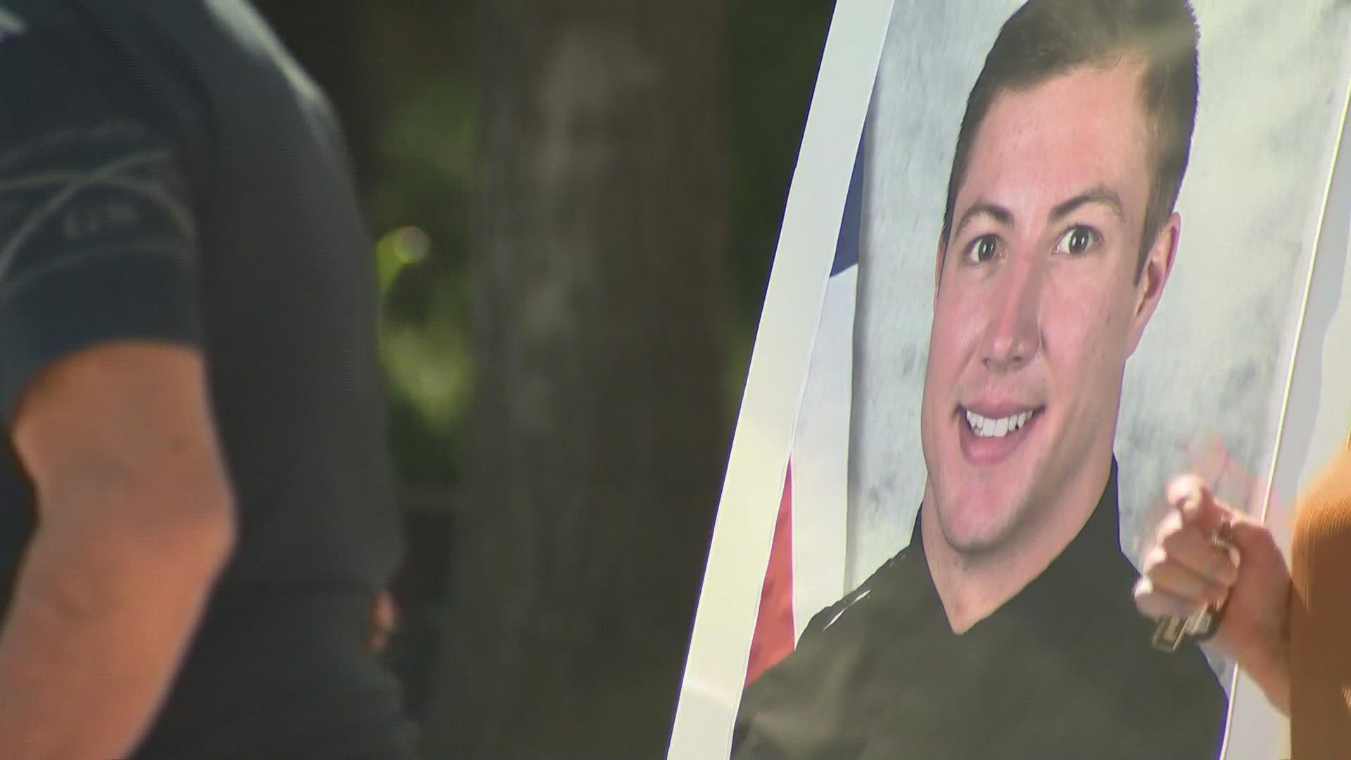 Officer Dillon Vakoff was fatally shot early Sunday. The suspect and a woman were also shot and are expected to survive, police said.