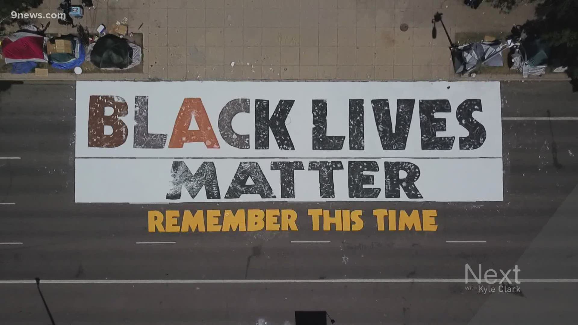 Denver closed part of Broadway, near the Colorado state Capitol, to allow local artists to paint a Black Lives Matter street mural. It was designed by Adri Norris.