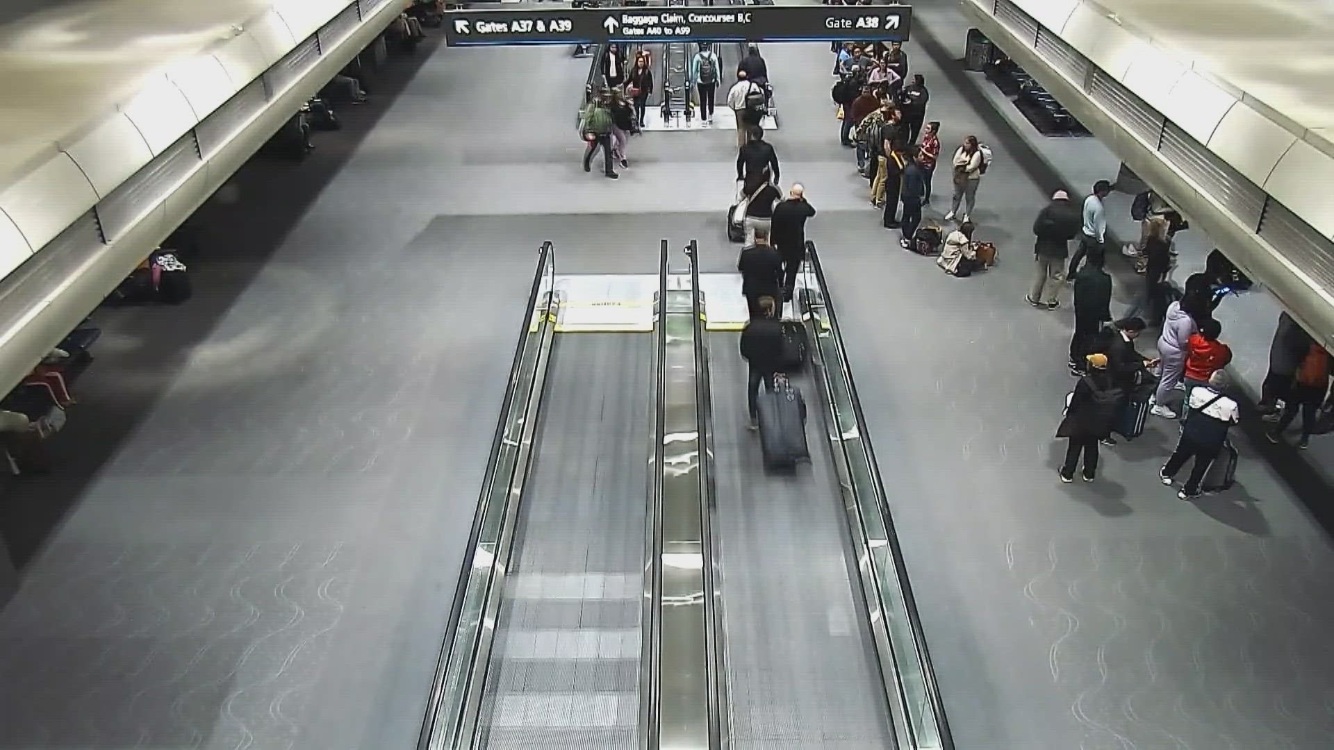 Video obtained by 9NEWS shows a missing part on a moving walkway moments before it “swallowed” a pilot’s foot, causing him to fall.