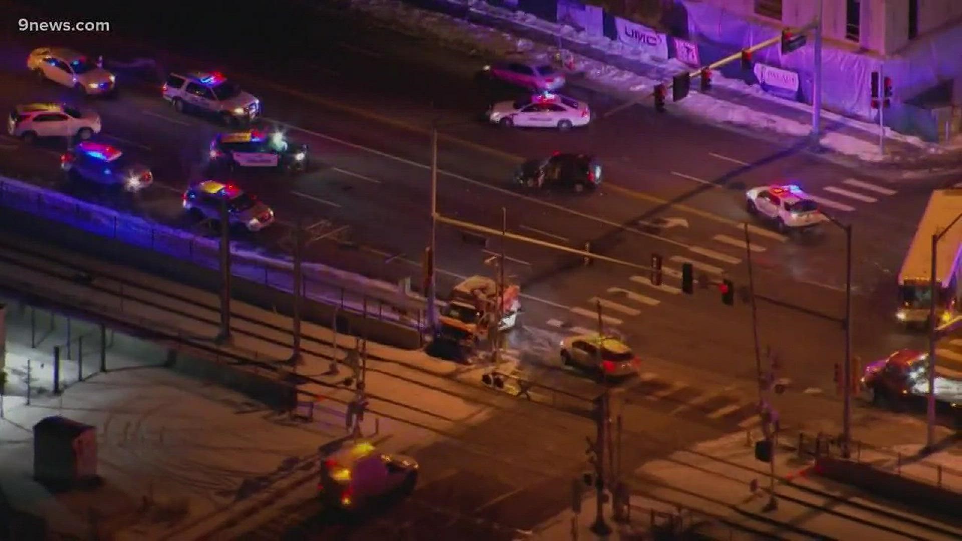 The ambulance smashed into an RTD crossing arm making them inoperable. No word on injuries at this time.