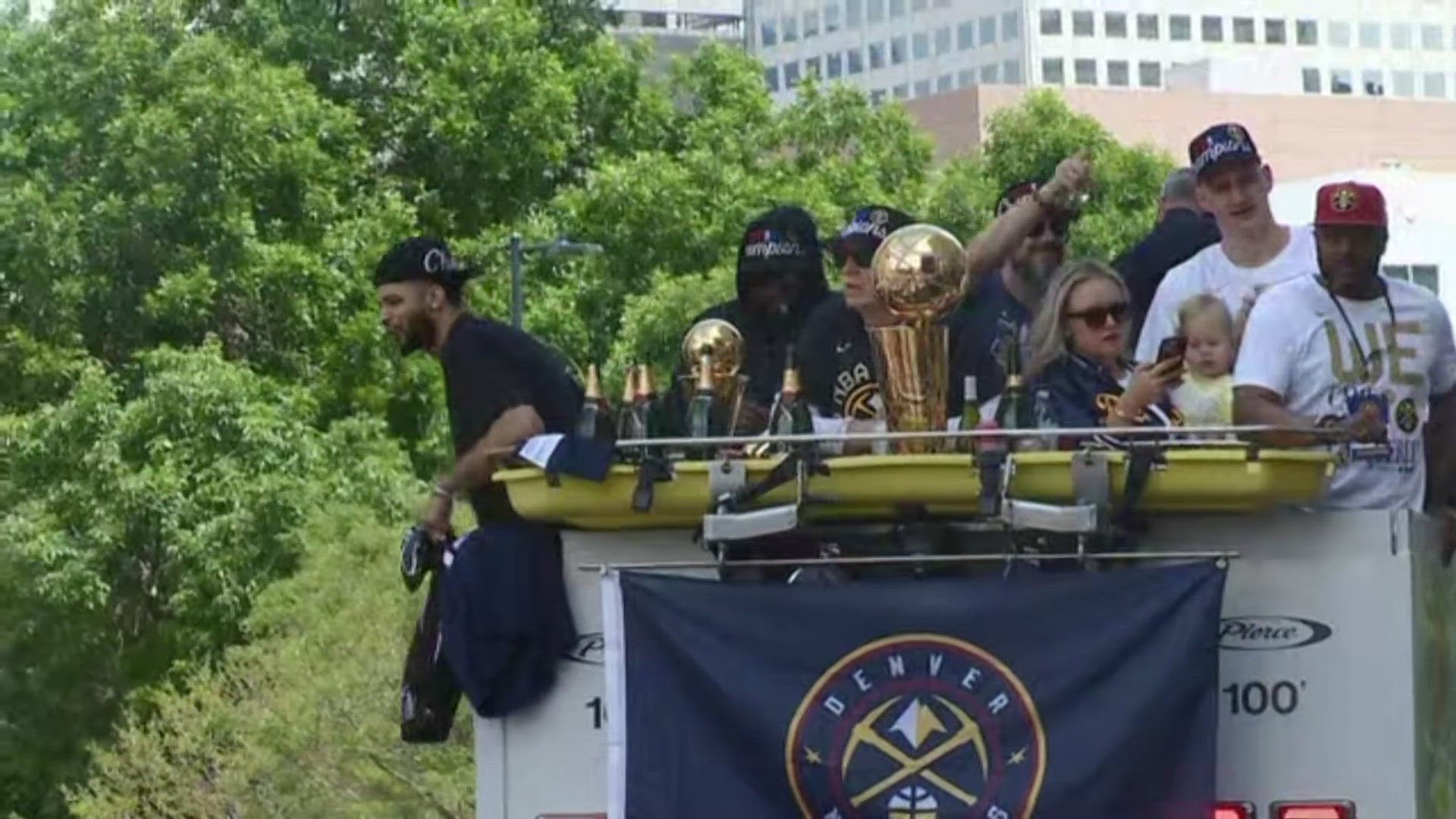 Fans were eager to greet the Denver Nuggets stars toward the end of the parade route near 13th and Broadway.