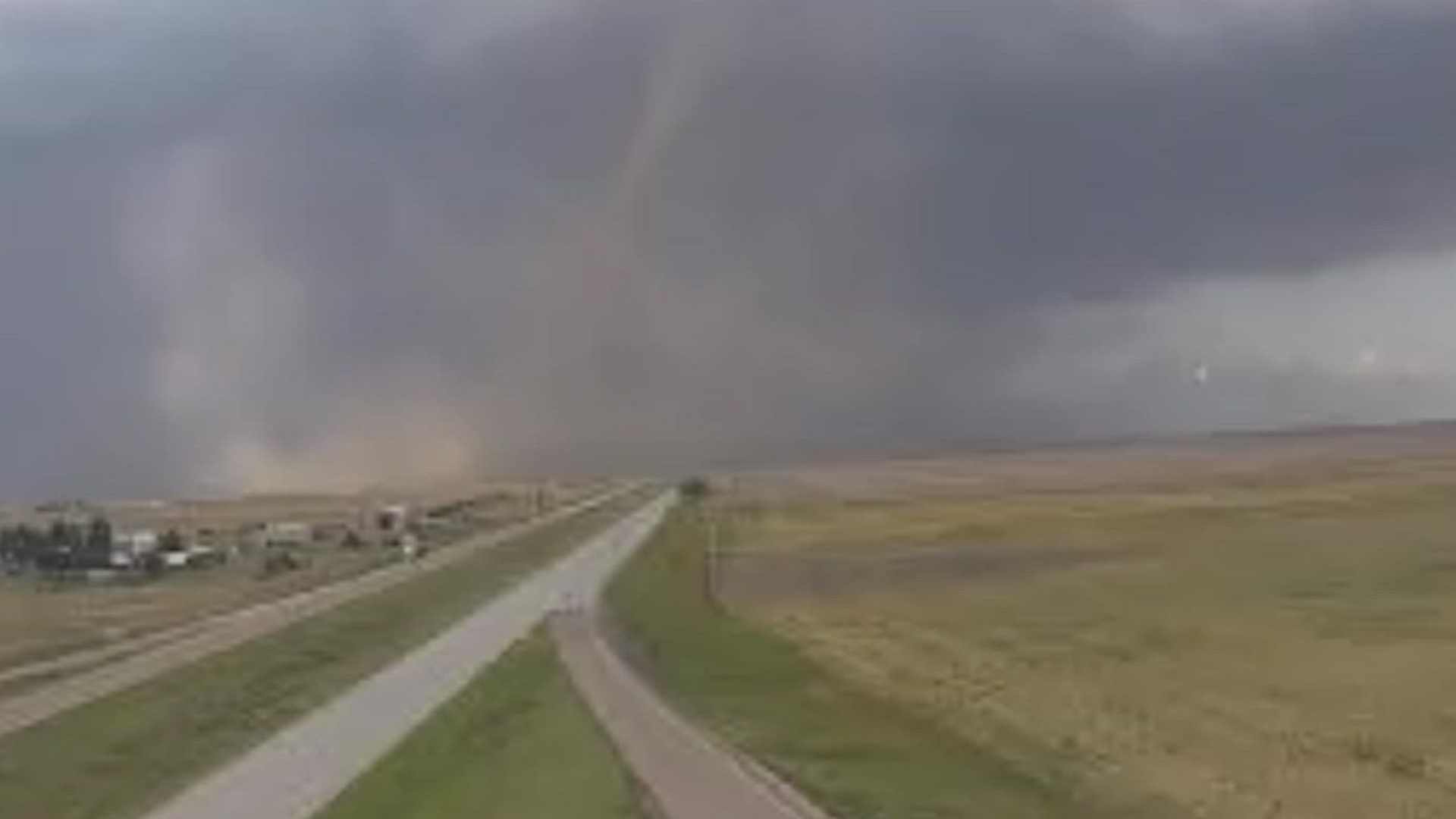 A Tornado Warning was in effect as a tornado crossed Interstate 70 in Kit Carson County, Colorado.