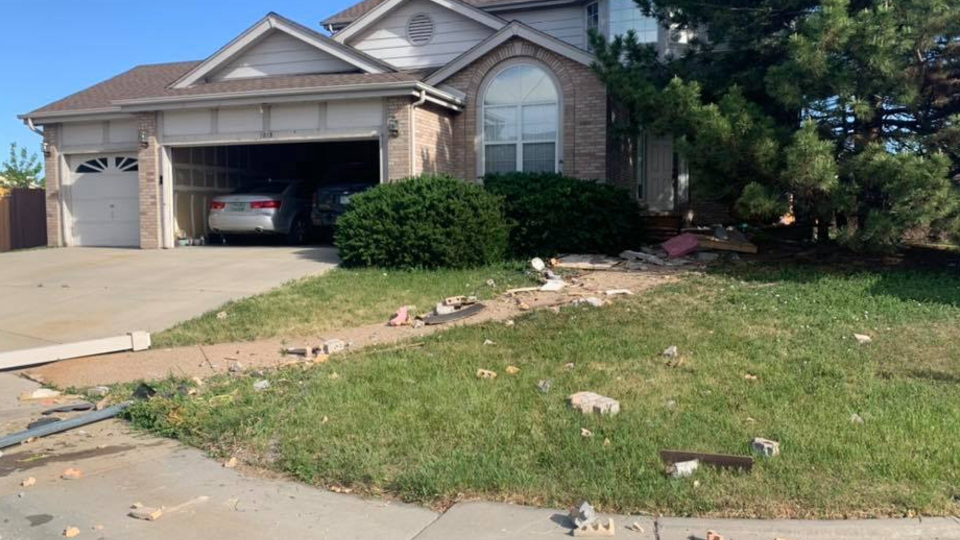 Car crashes through backyard, hits house in Broomfield