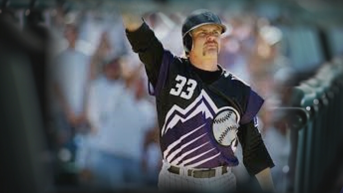 Colorado Rockies baseball fans wearing MLB jerseys showing their favorite  Rockies players attend a game at Coors Field in Denver, Colorado Stock  Photo - Alamy
