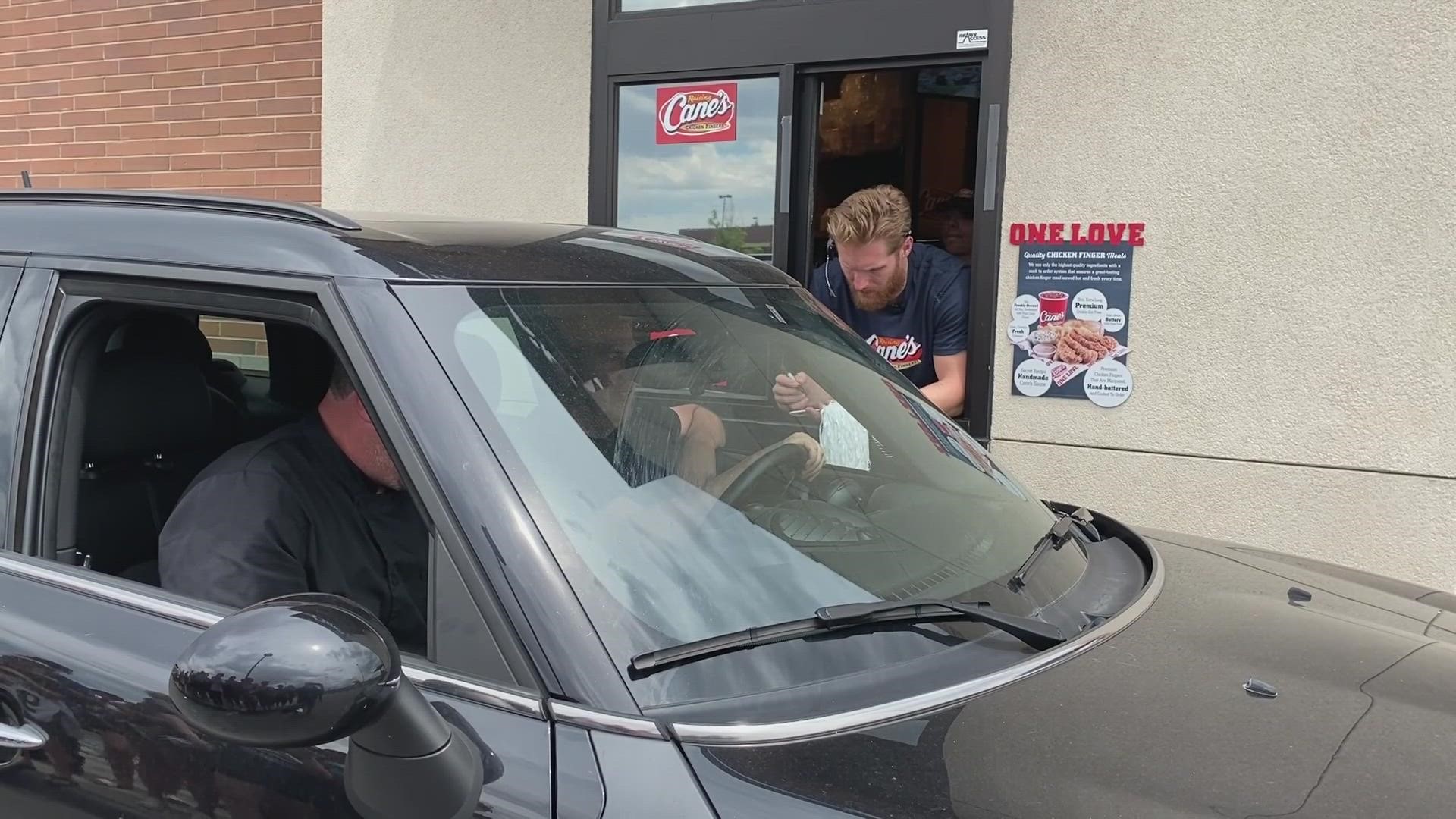 Fresh off a Stanley Cup victory, Landeskog was celebrating with fans by dishing out chicken fingers Wednesday afternoon at Raising Cane's.