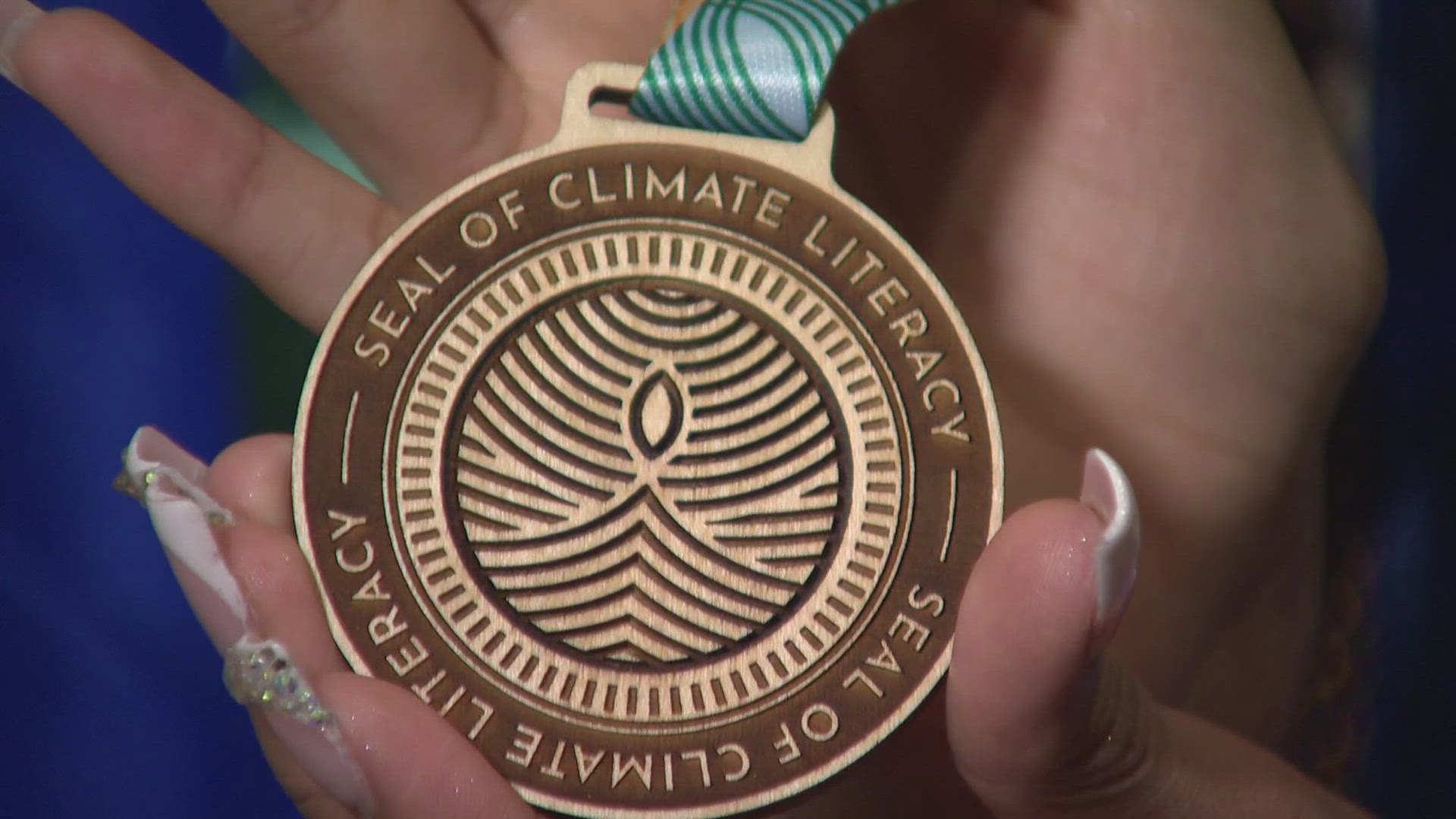 The seal honors the completion of climate-based coursework, in addition to a community project.