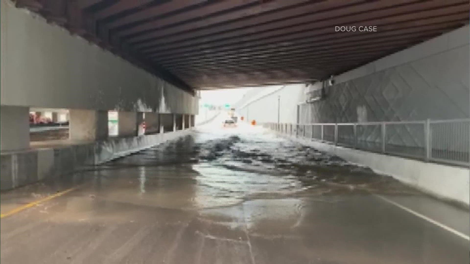 The Denver Fire Department said crews rescued people from vehicles on Interstate 70 and at other locations as streets flooded from torrential rainfall.