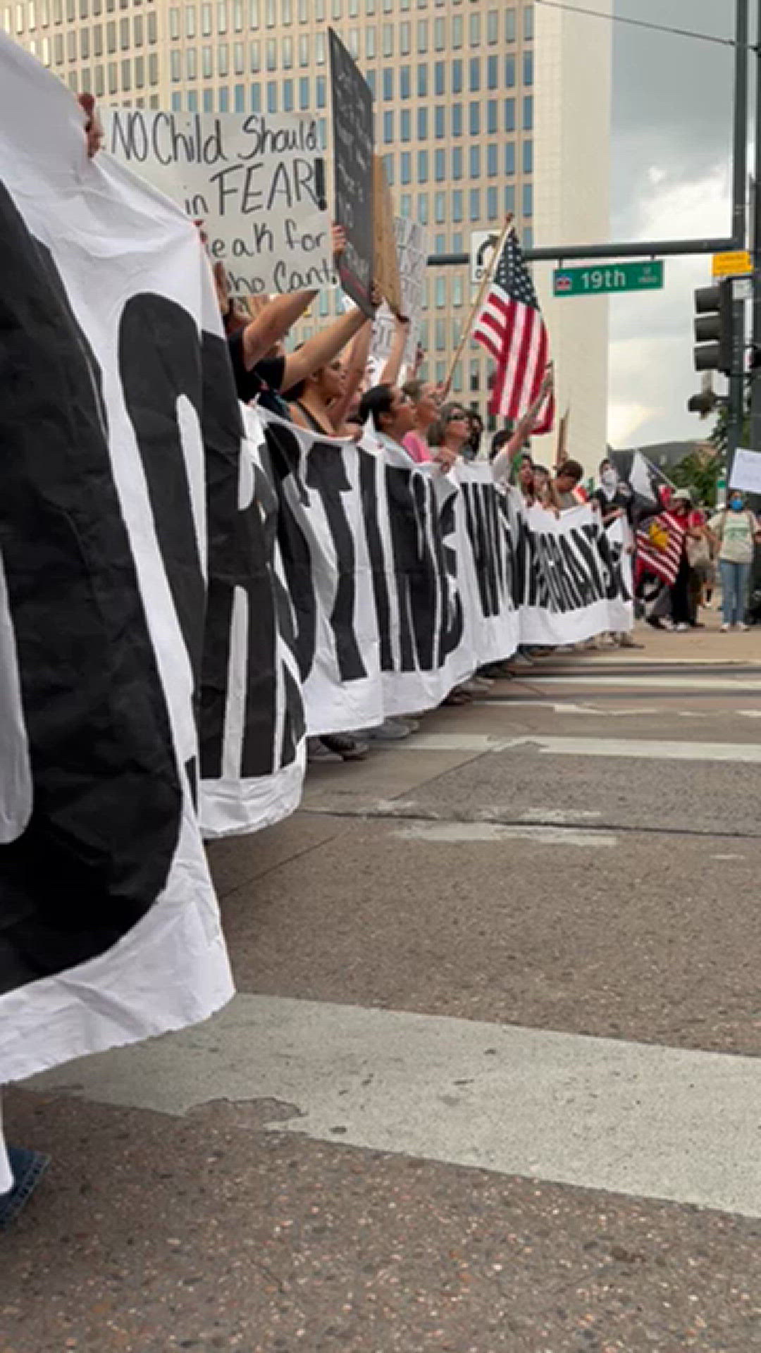 Protestors chanting near 19th Street in Denver.