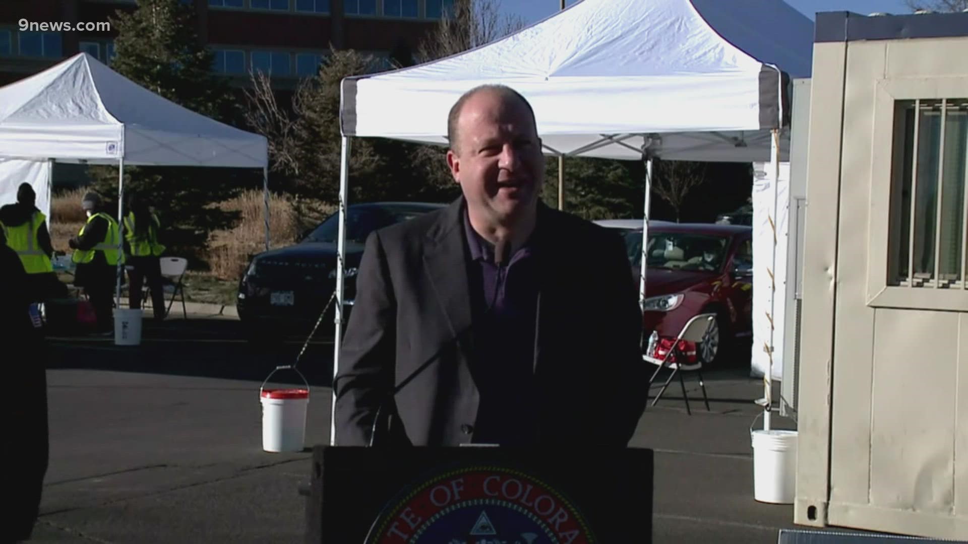 Gov. Jared Polis (D-Colo.) and Mayor Mike Coffman (R-Aurora) spoke Thursday morning from a vaccination site.