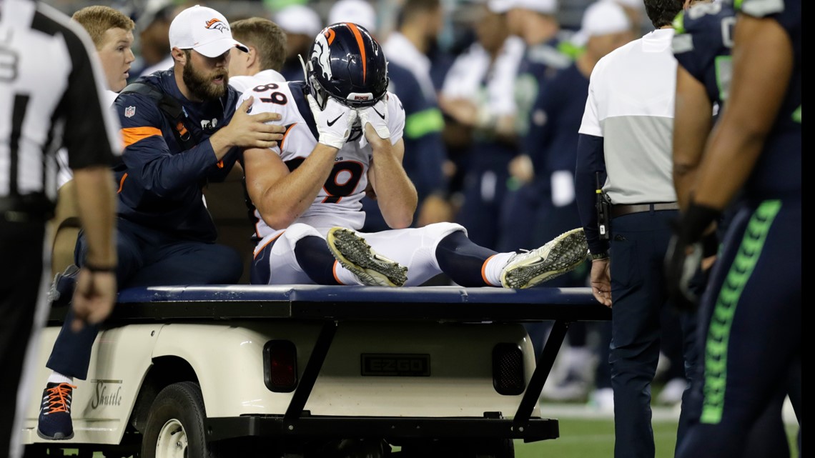 Denver Broncos fullback Andy Janovich (32) takes part in drills