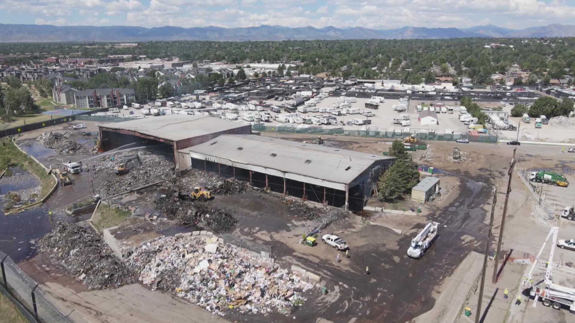 The fire started burning Monday afternoon at a Waste Management facility in Englewood. Smoke blew across the Denver area as crews fought the fire.