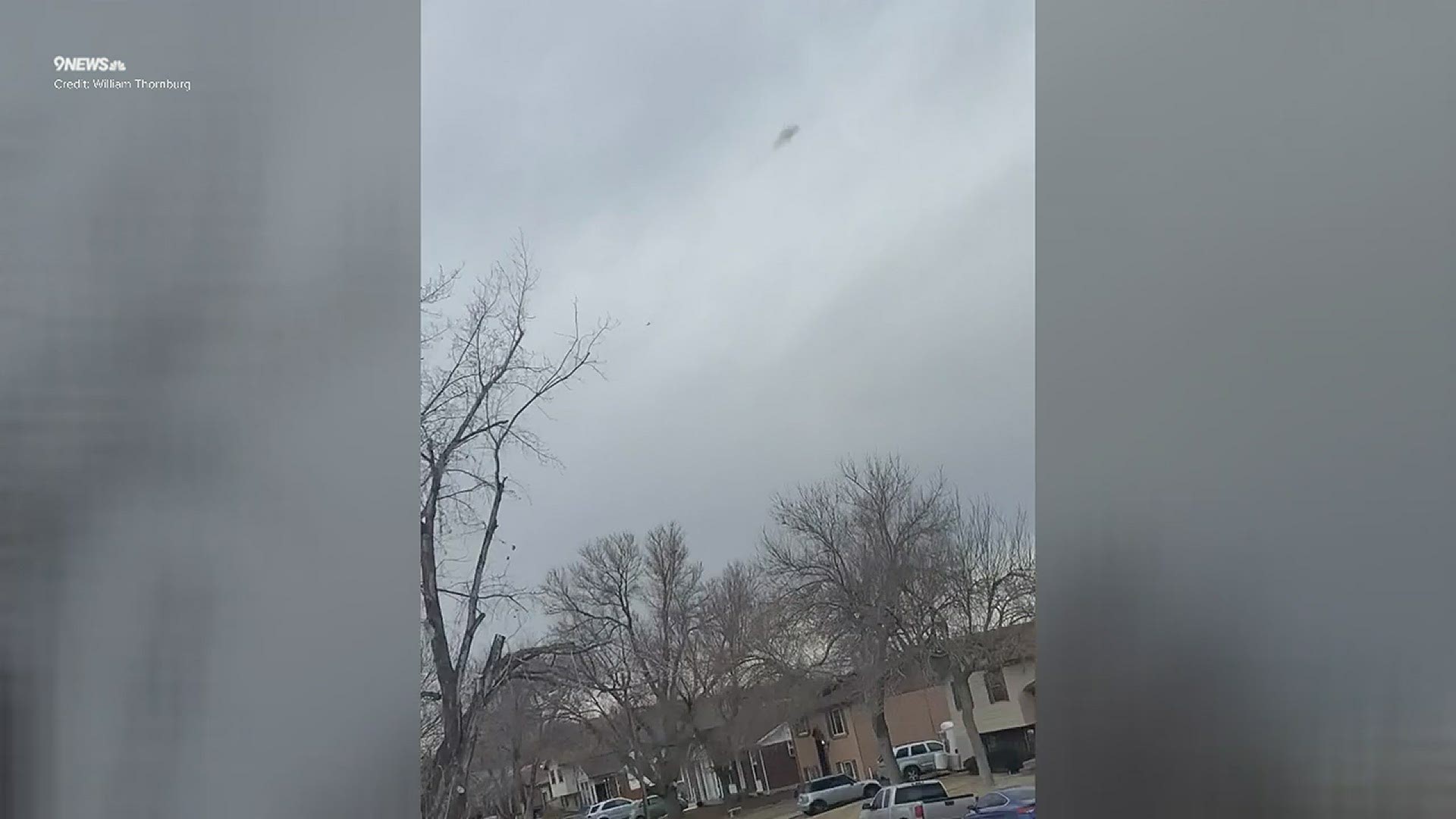 Watch this footage from 9NEWS viewer William Thornburg's, as he describes a plane flying overhead and then a ball of smoke followed by a trail of smoke.