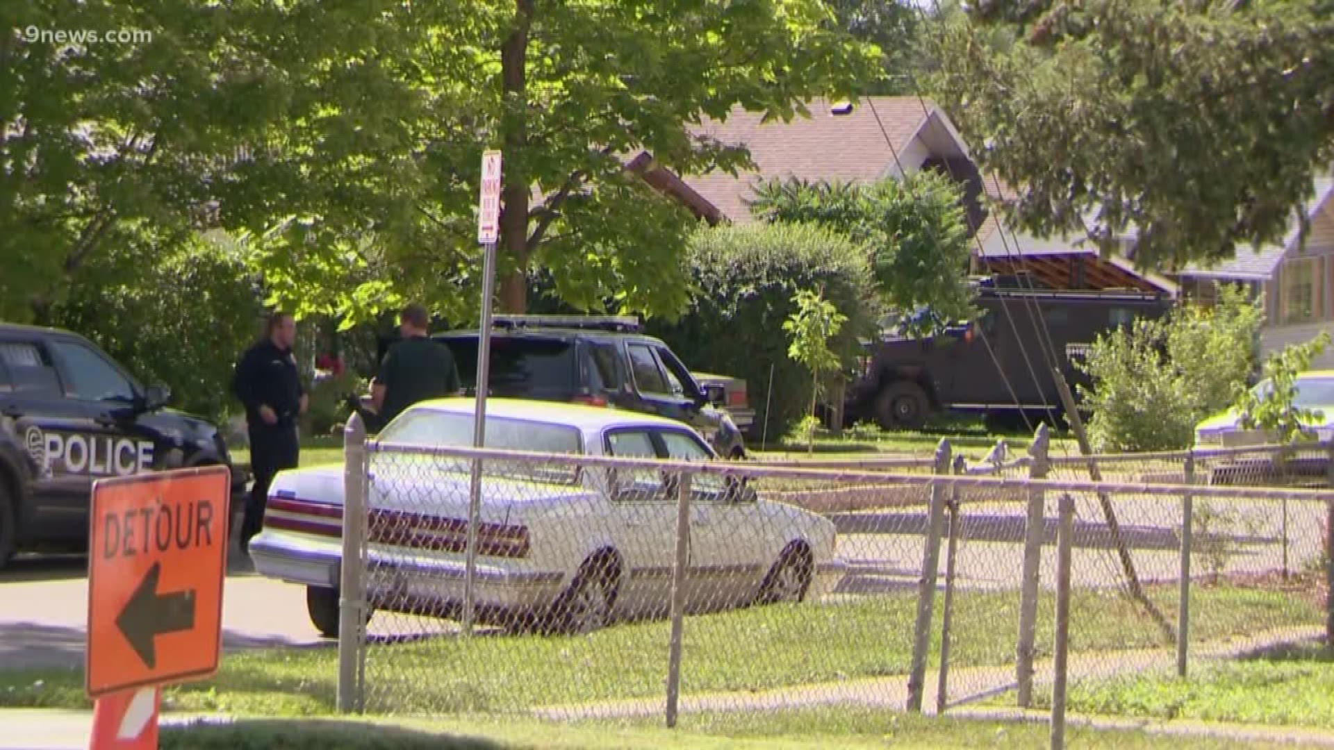 Law enforcement officers have surrounded a home in Edgewater where a suspect has barricaded himself inside.