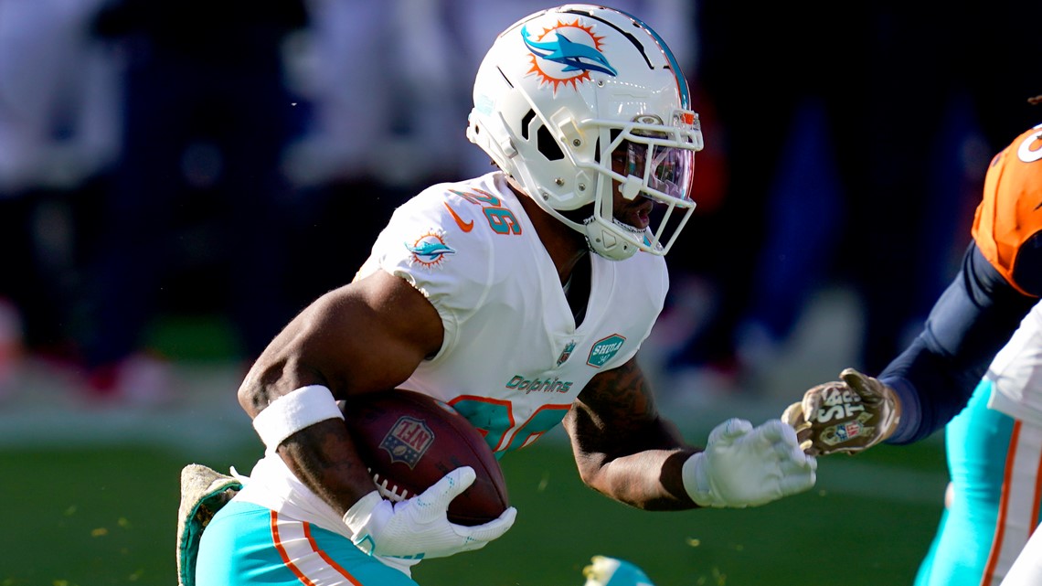 Miami Dolphins defensive end Shaq Lawson (90) lines up against the Denver  Broncos during the first half of an an NFL football game, Sunday, Nov.. 22,  2020, in Denver. (AP Photo/Justin Edmonds