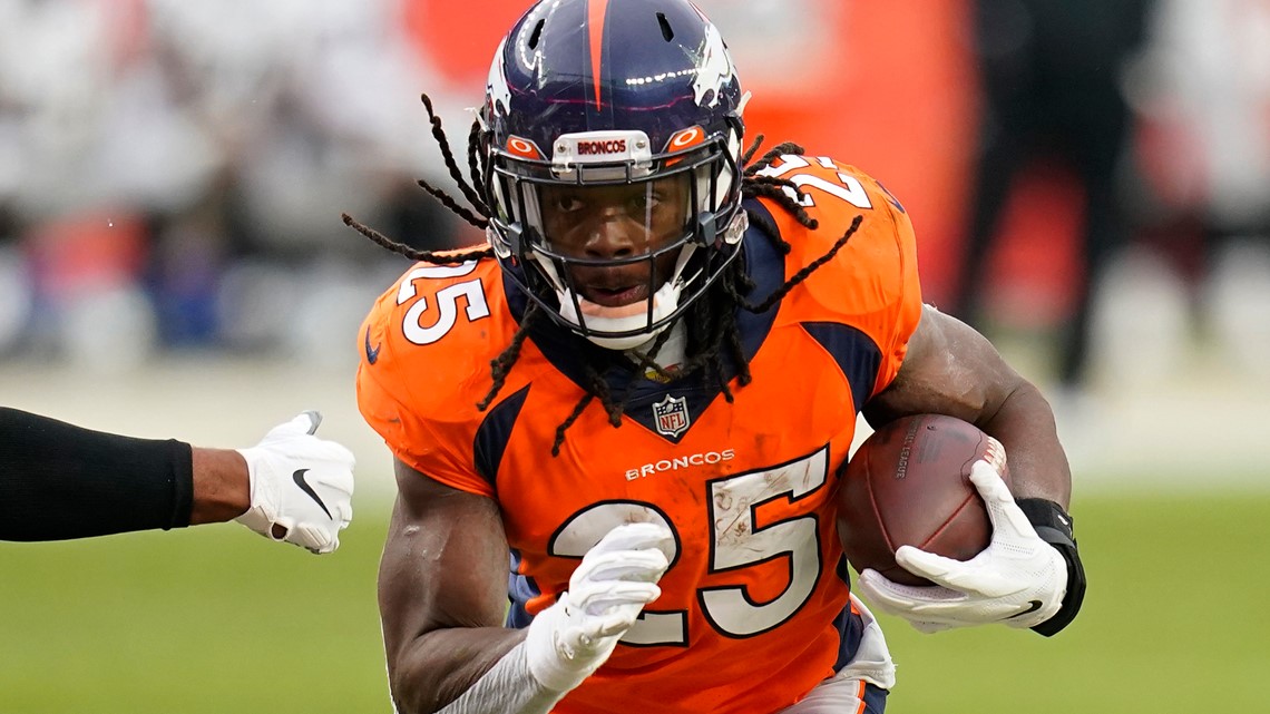 Denver Broncos running back Melvin Gordon (25) runs against the Detroit  Lions during an NFL football game Sunday, Dec. 12, 2021, in Denver. (AP  Photo/Jack Dempsey Stock Photo - Alamy