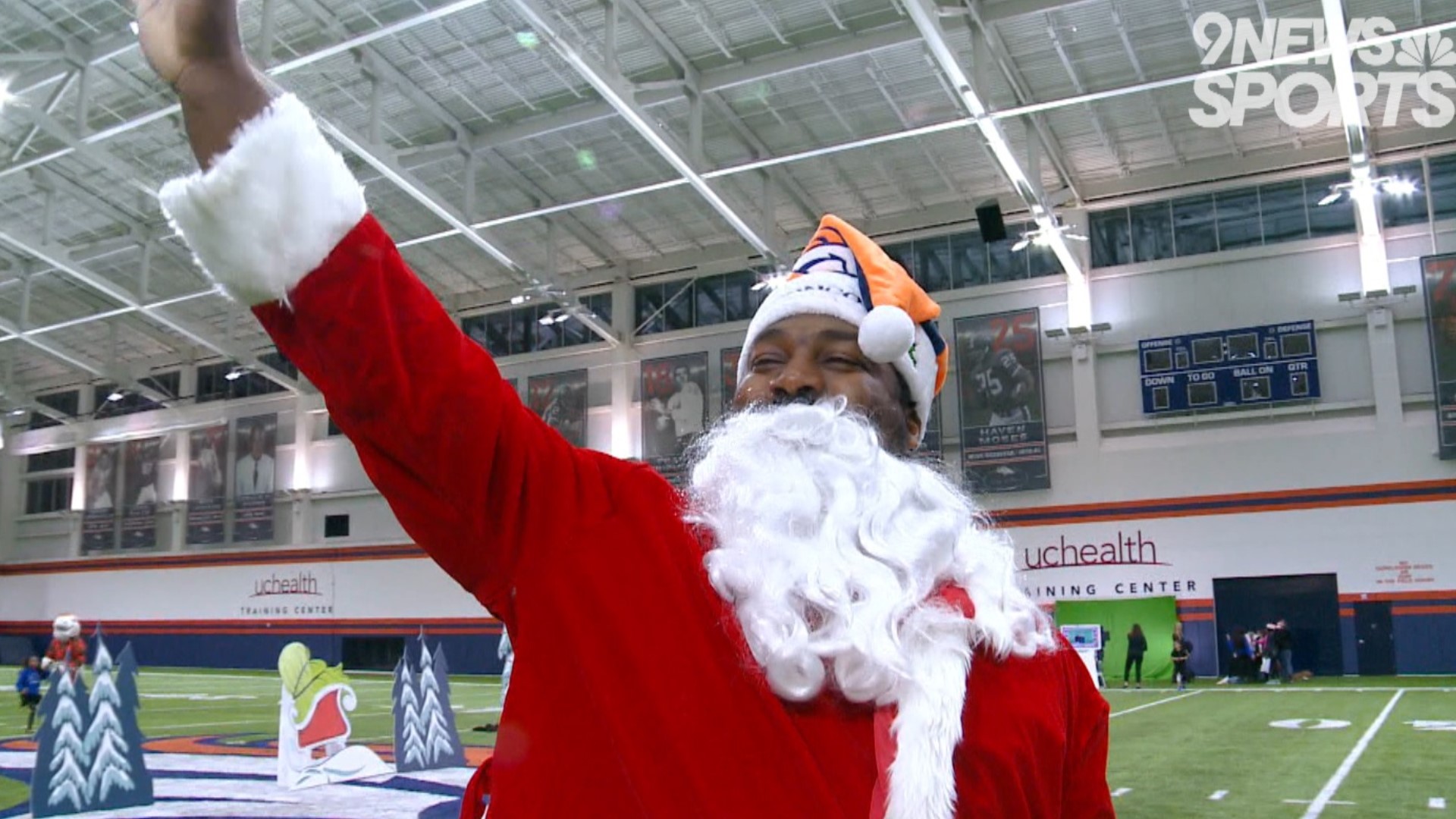 Broncos nose tackle Shelby Harris dressed up as Santa Claus and entertained children at the Pat Bowlen Fieldhouse for the holiday season.