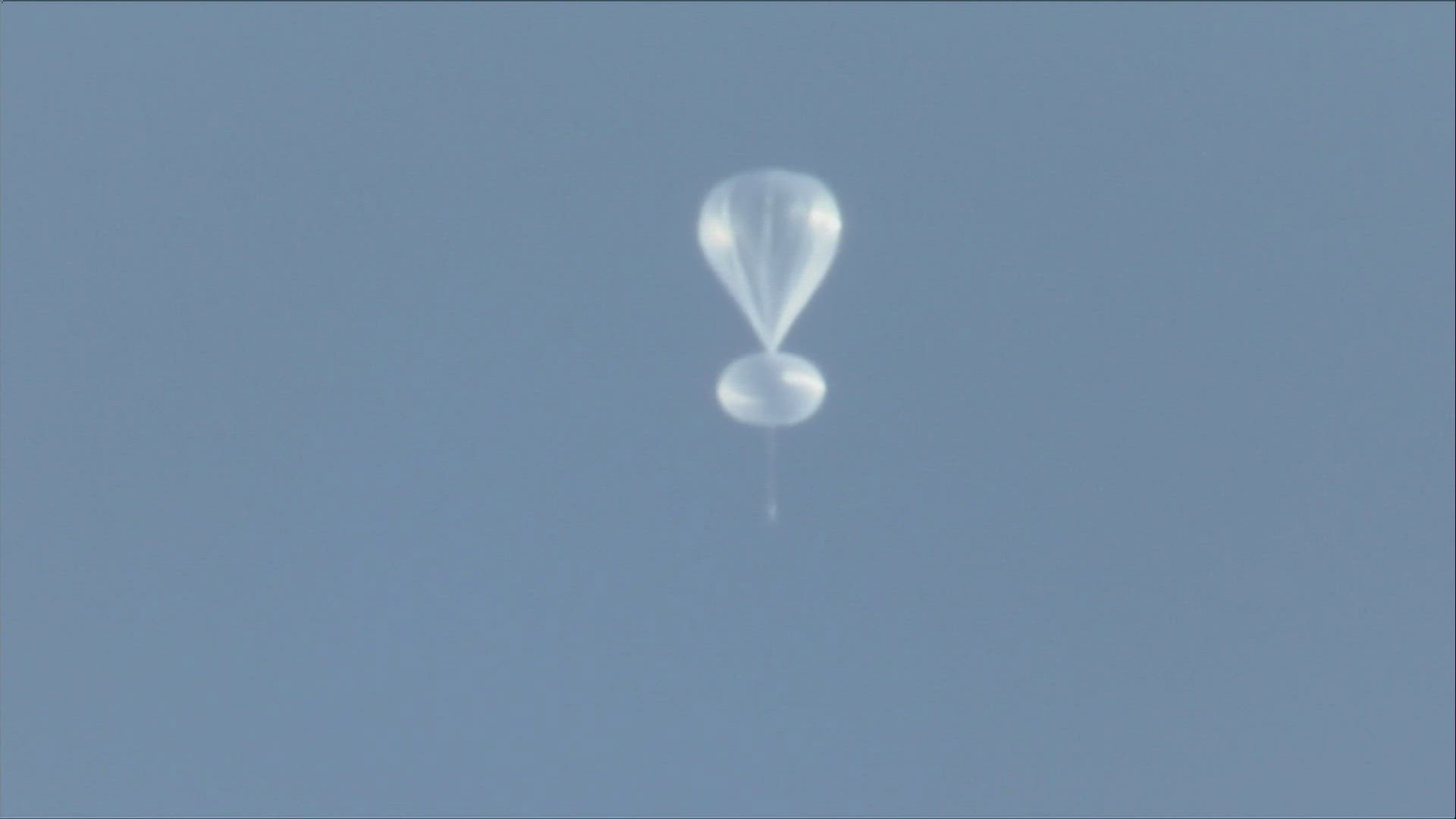 The large, white balloon was spotted flying at high altitude Friday morning at several locations the Front Range.