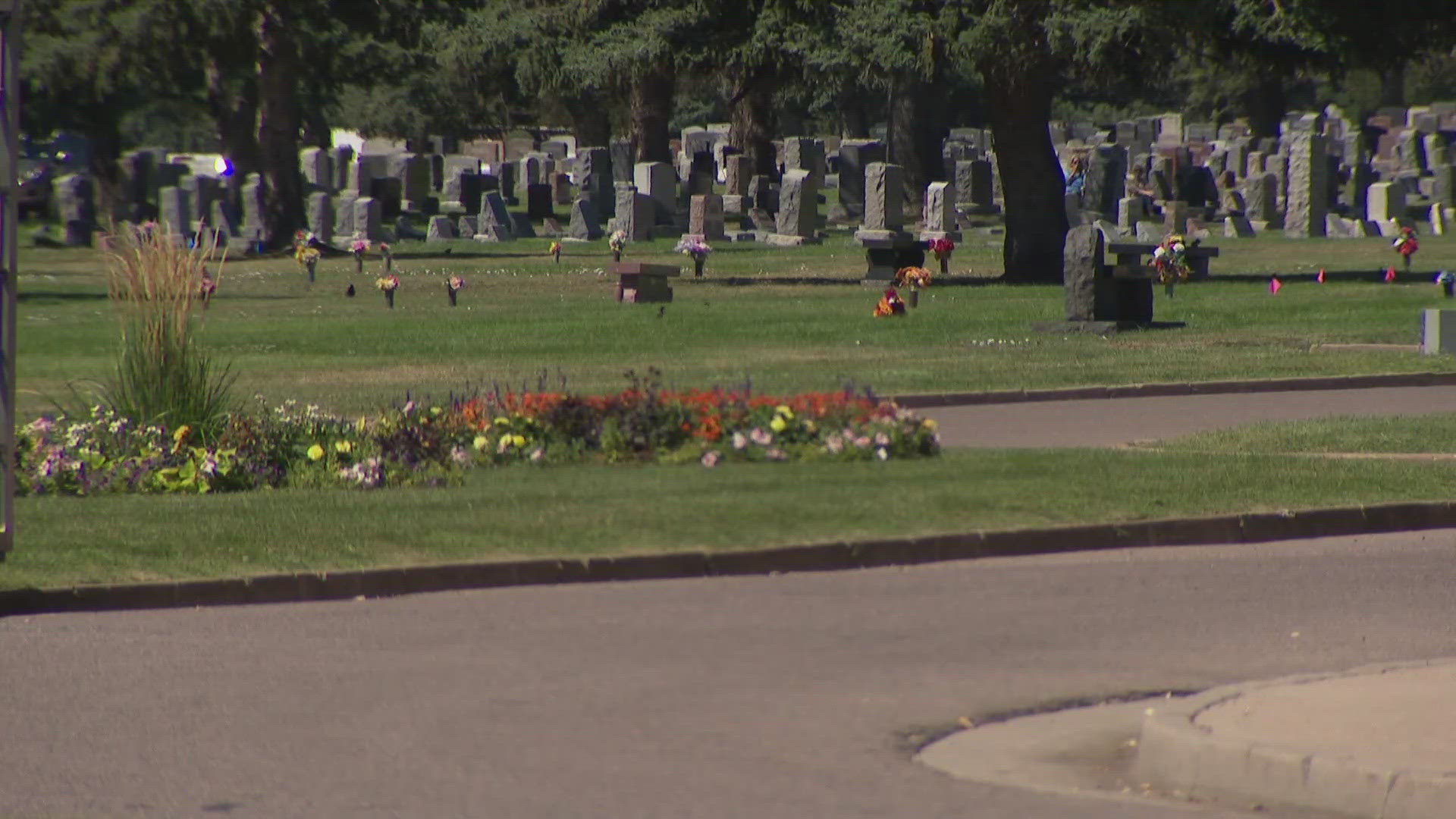 A man was killed and another was arrested on suspicion of murder after a shooting at a cemetery in Wheat Ridge Saturday night.