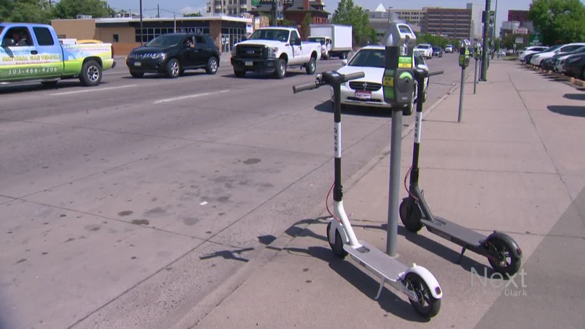 Electric scooters banned from Denver sidewalks, city council votes