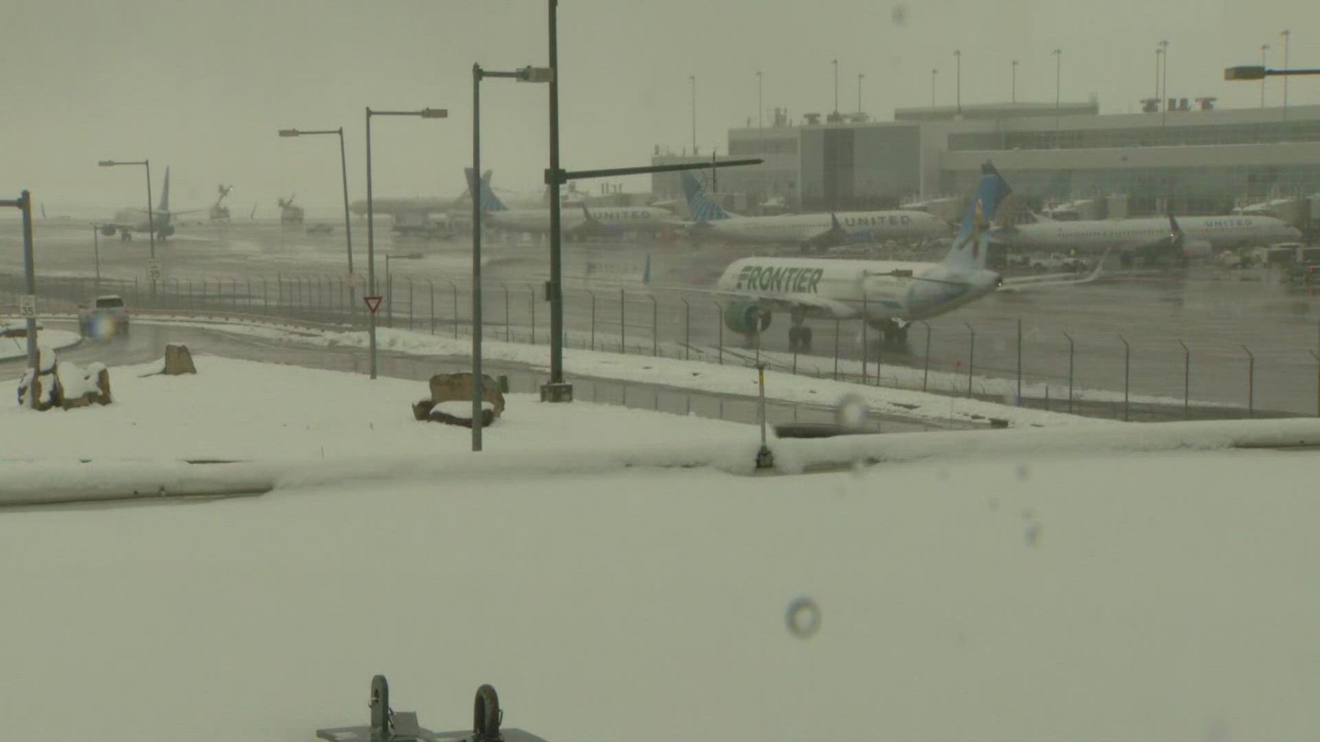 Michael Konopasek with DIA says conditions "should improve" soon, but tells customers to prepare for delays on morning and early afternoon flights Saturday.