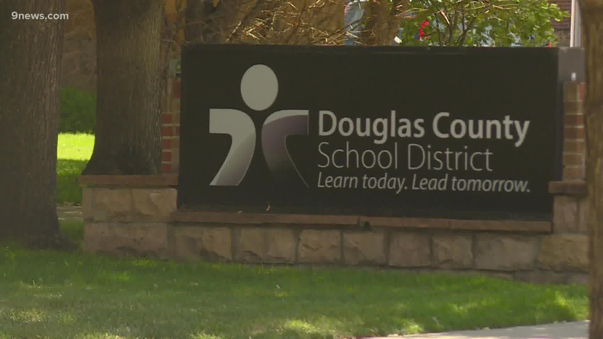 The Douglas County School District sued to block enforcement of the county's order granting mask exemptions.