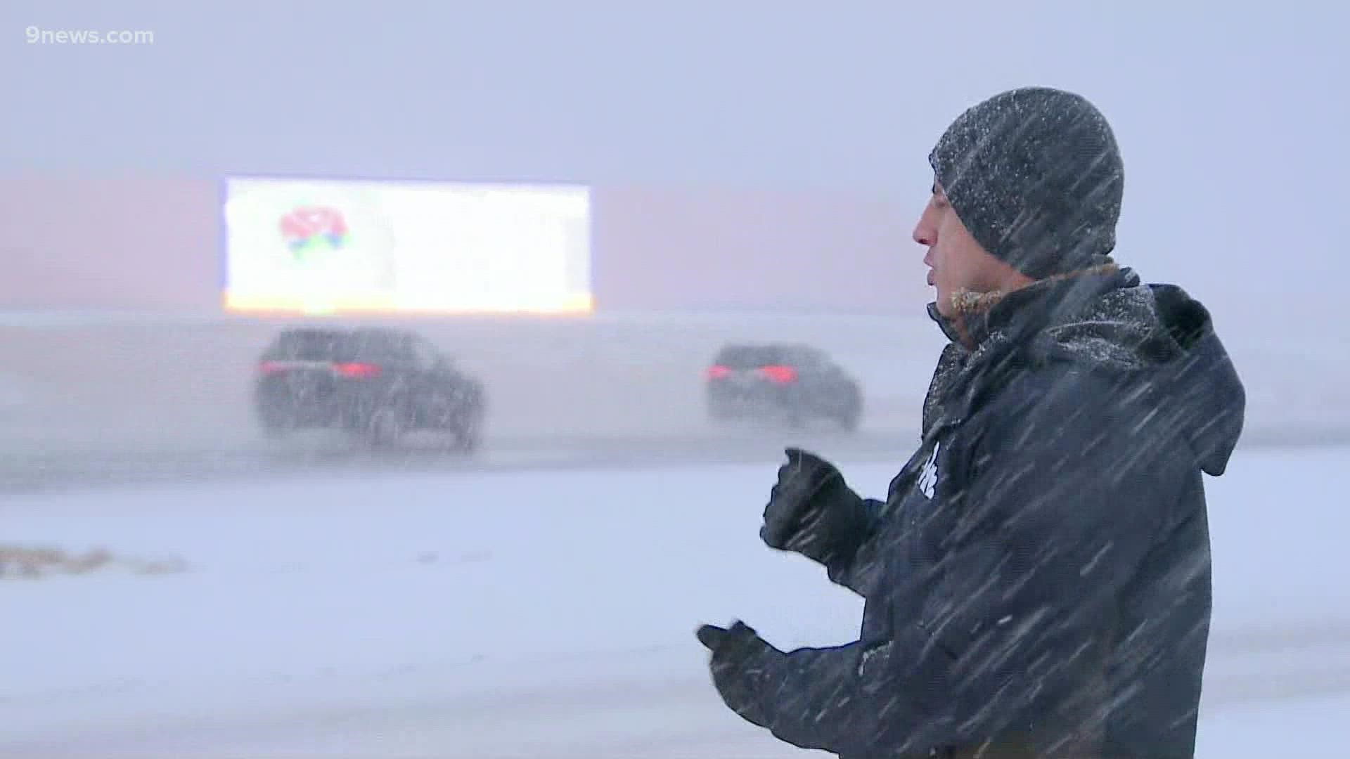 9NEWS Reporter Jordan Chavez has a look at snowy road conditions near Denver International Airport on Tuesday morning.