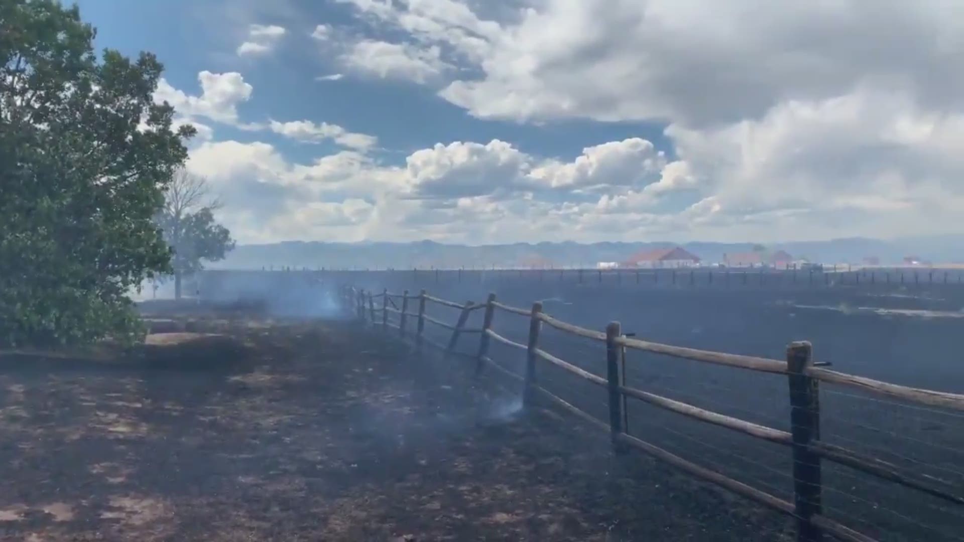 Firefighters continue to battle several acres of brush burning between Chatfield Drive and the Back Country Subdivisions.