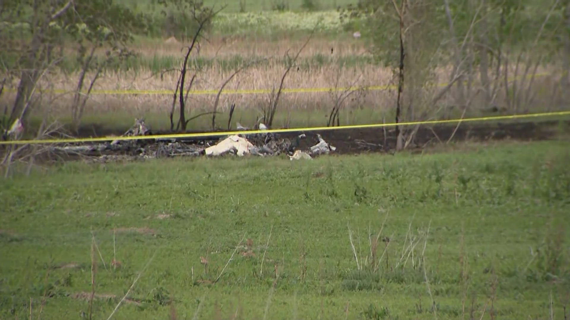 The plane caught fire after it crashed in a field near Midway Boulevard and Brainard Drive, according to North Metro Fire. 