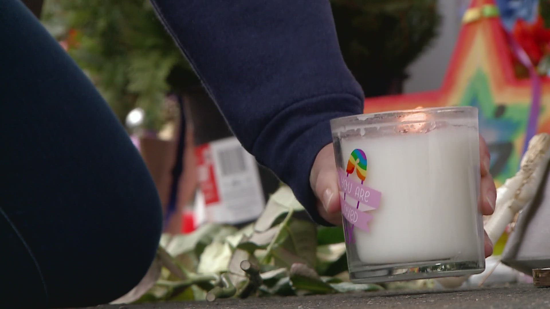 Survivors, families of victims, community leaders and many others gathered outside Club Q Sunday to remember the victims of the shooting there one year ago.