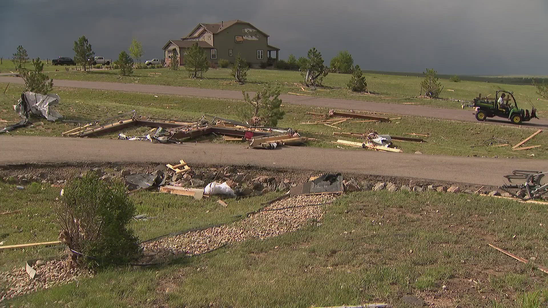 Damage and debris was scatter across the road, yards and fields near the Elkhorn neighborhood in Elbert County after a tornado swept through Sunday afternoon.