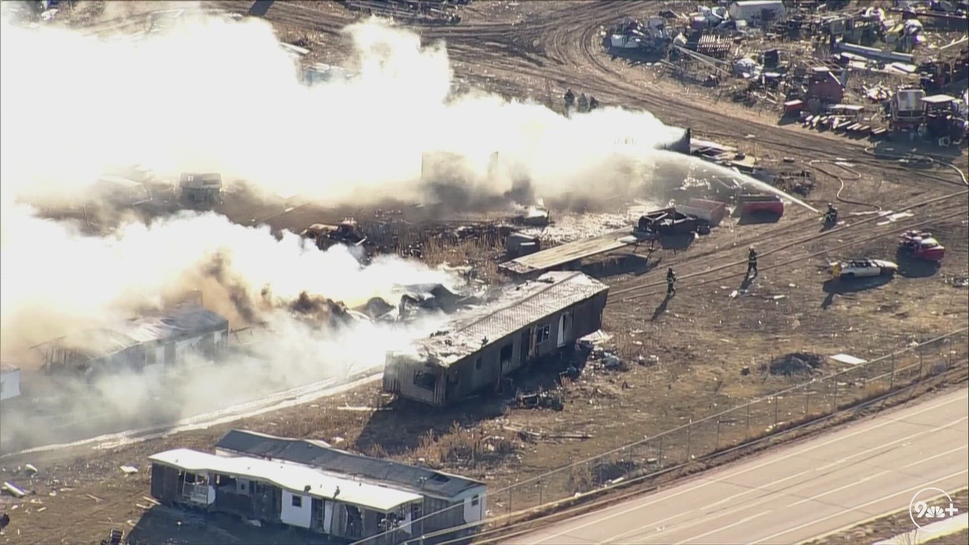 A large smoke plume was visible Thursday for much of the Denver metro area from a fire burning at a junkyard just off of Interstate 25 near E-470.