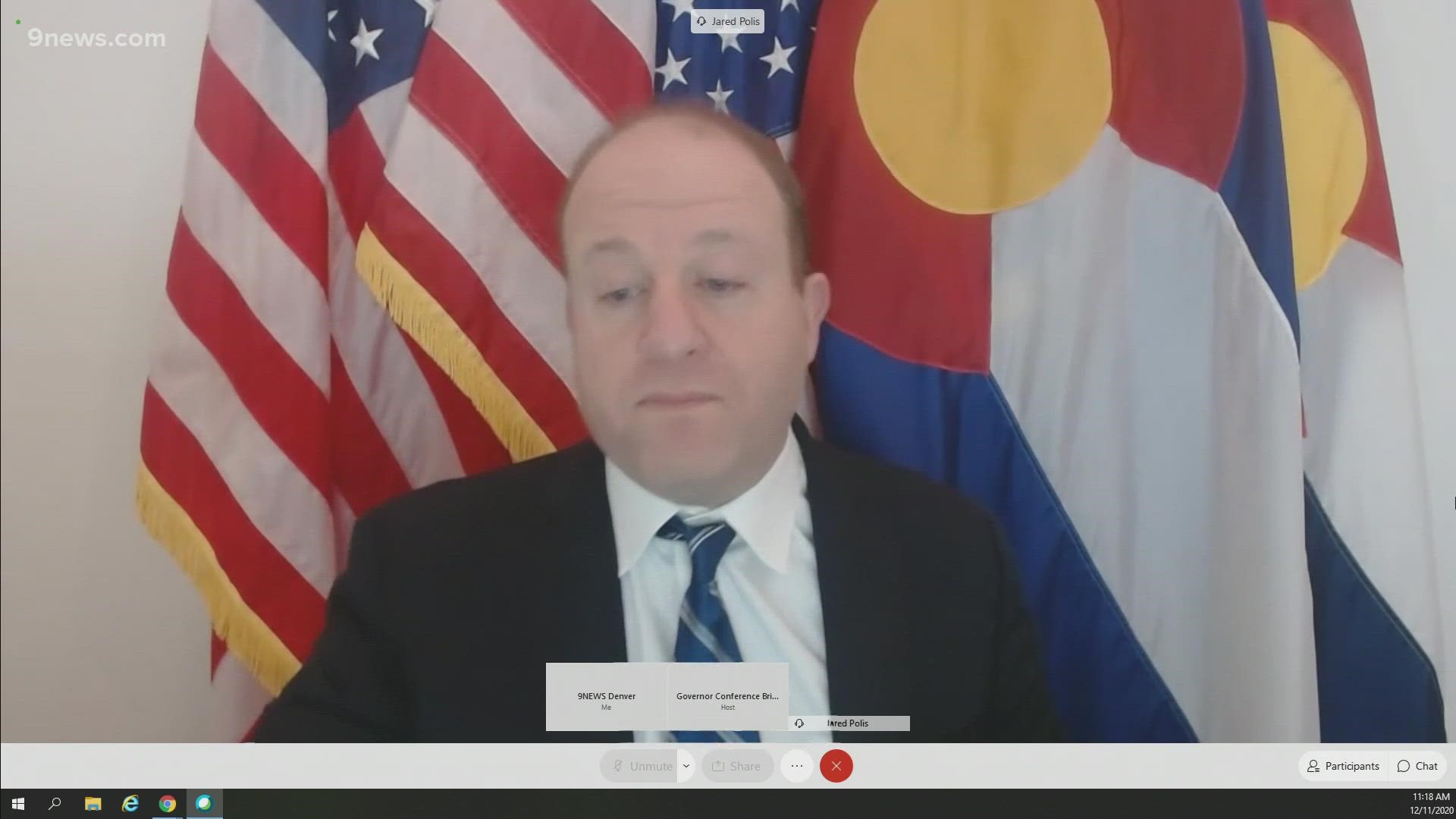 Gov. Polis (D-Colo.) gives an update on the state's response to COVID-19 on Dec. 11, 2020.