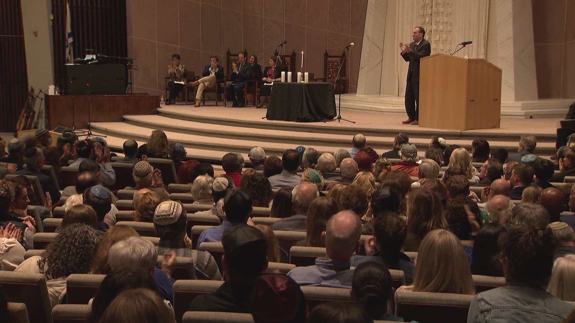 The vigil brought together members of the Jewish community and local leaders. Organizers wanted to call attention to what's happening and ask for support.