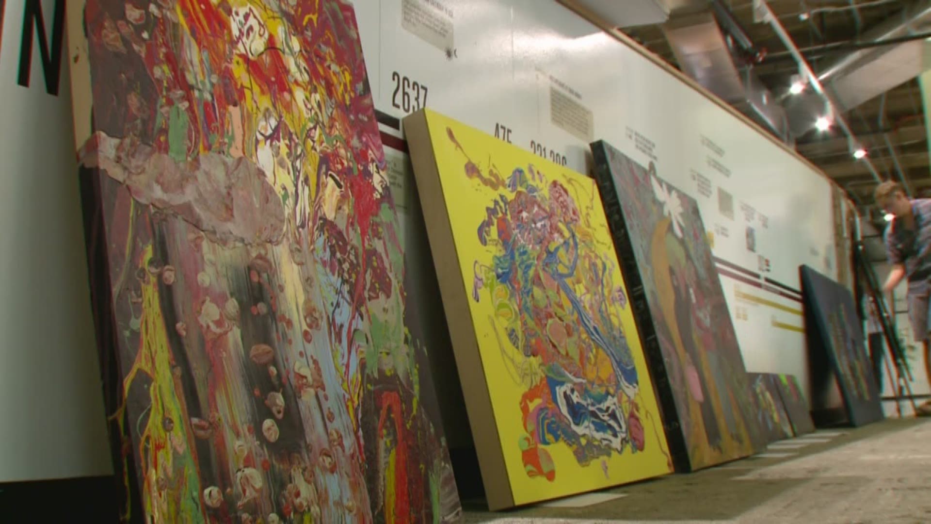 A group of local artists donated their work to an auction in hopes of raising money to help reunite families separated at the border. 