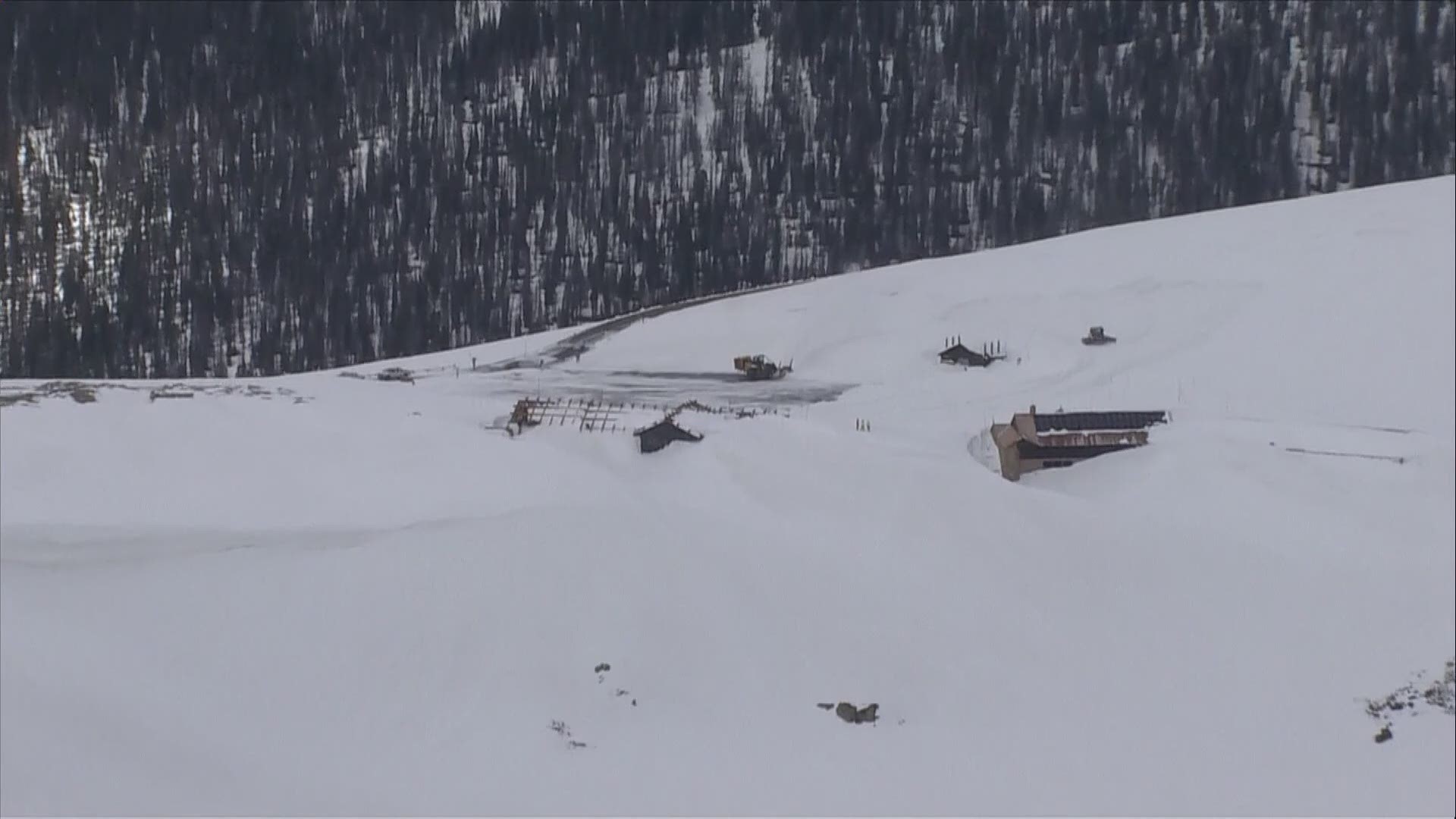 The Alpine Visitors Center at Rocky Mountain National Park is still nearly buried in snow. Photos and video taken along Trail Ridge Road inside the park show what snowplow operators are up against as work to get the road open for the season.
