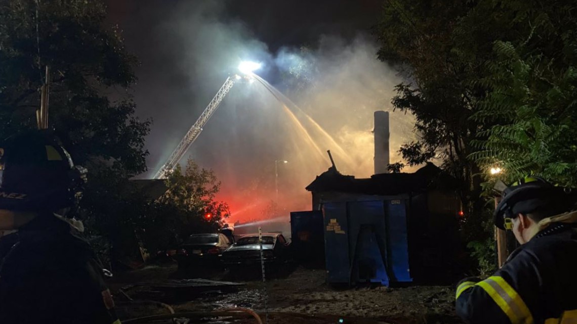 Crews investigate early morning house fire in Denver