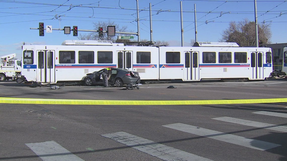 Car fleeing shooting scene crashes into RTD light rail train in Aurora ...