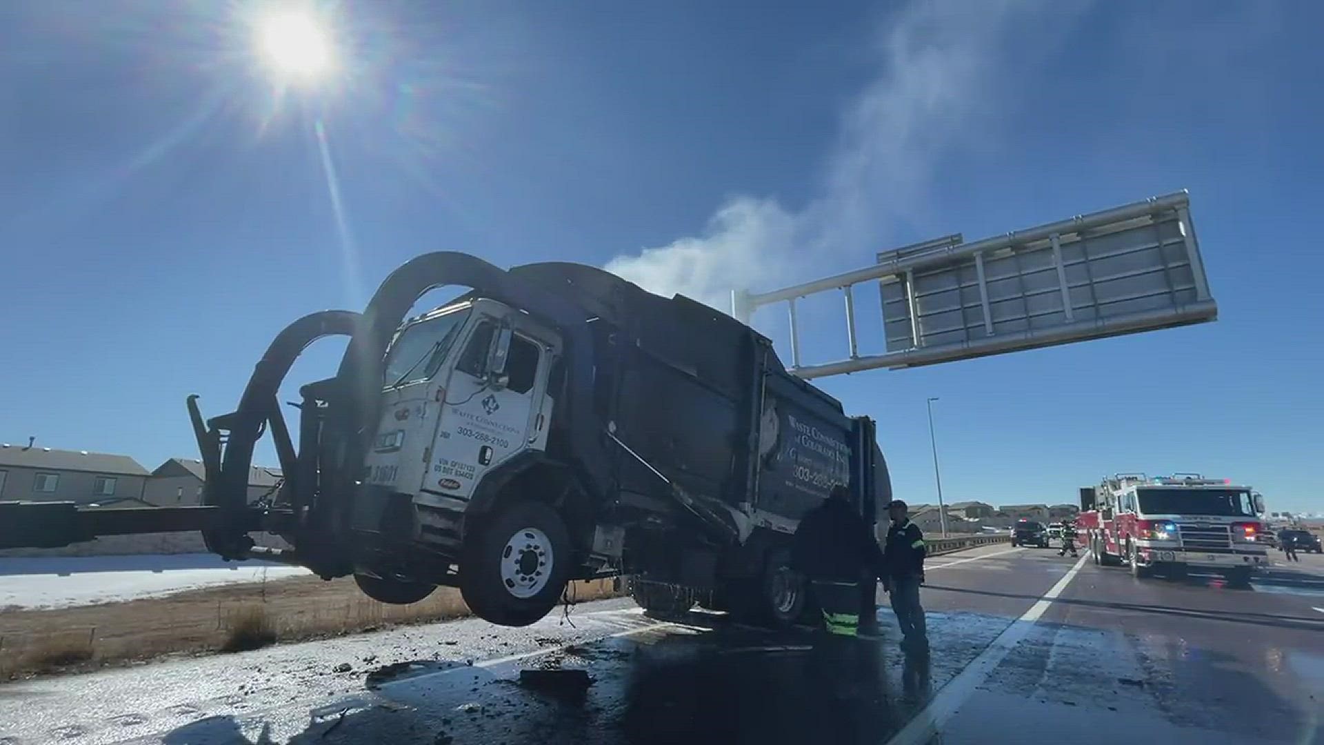 South Metro Fire Rescue crews had the still-burning garbage truck towed to a dump after being unable to put the fire out despite spraying 7,300 gallons of water.