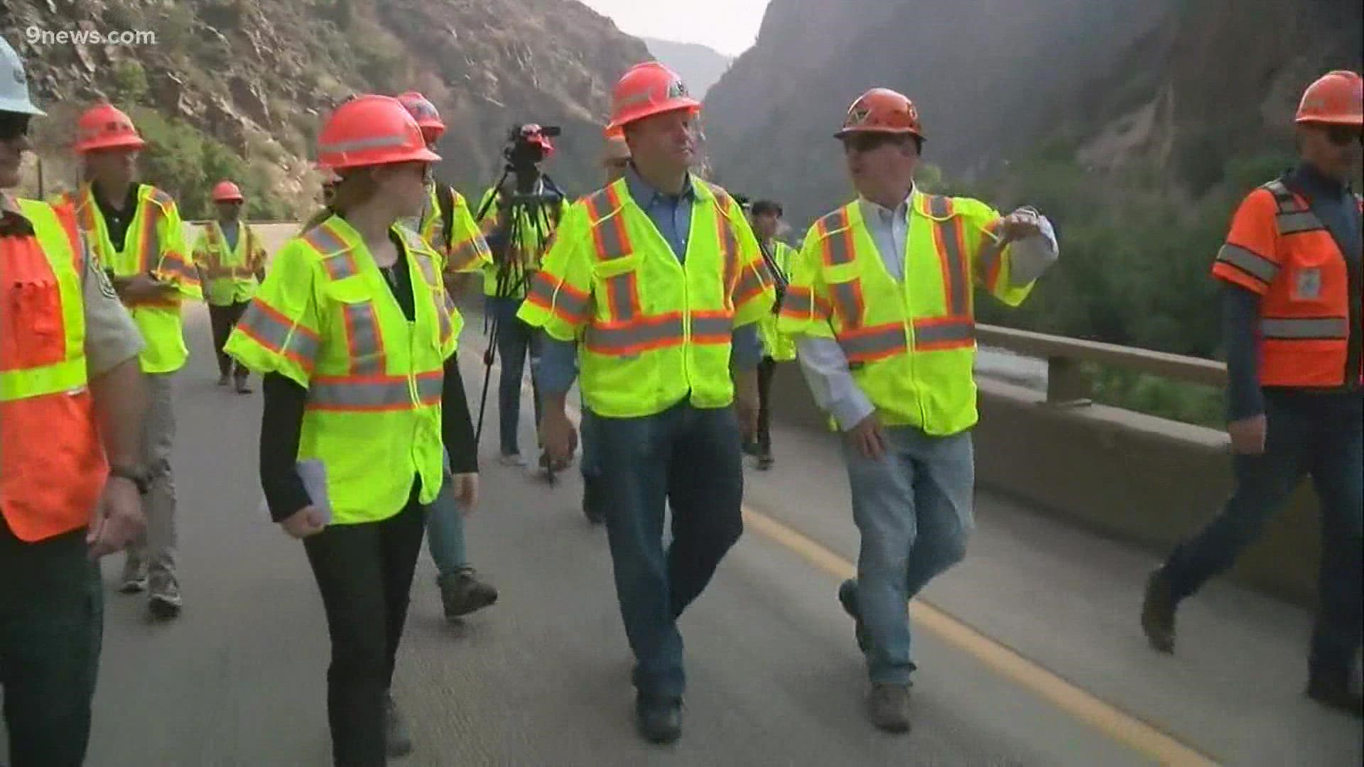 Gov. Polis visited Glenwood Canyon to survey the damage caused by mudslides that have kept the road closed for nearly two weeks.