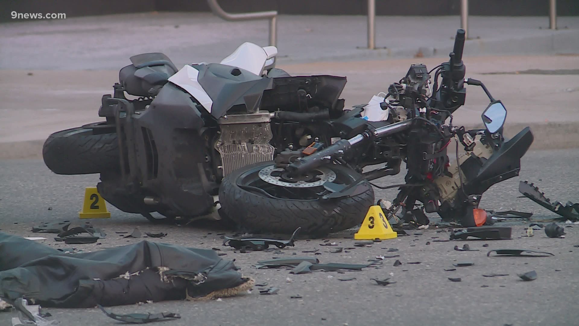 Crash involving Denver officer sends motorcyclist to hospital Friday