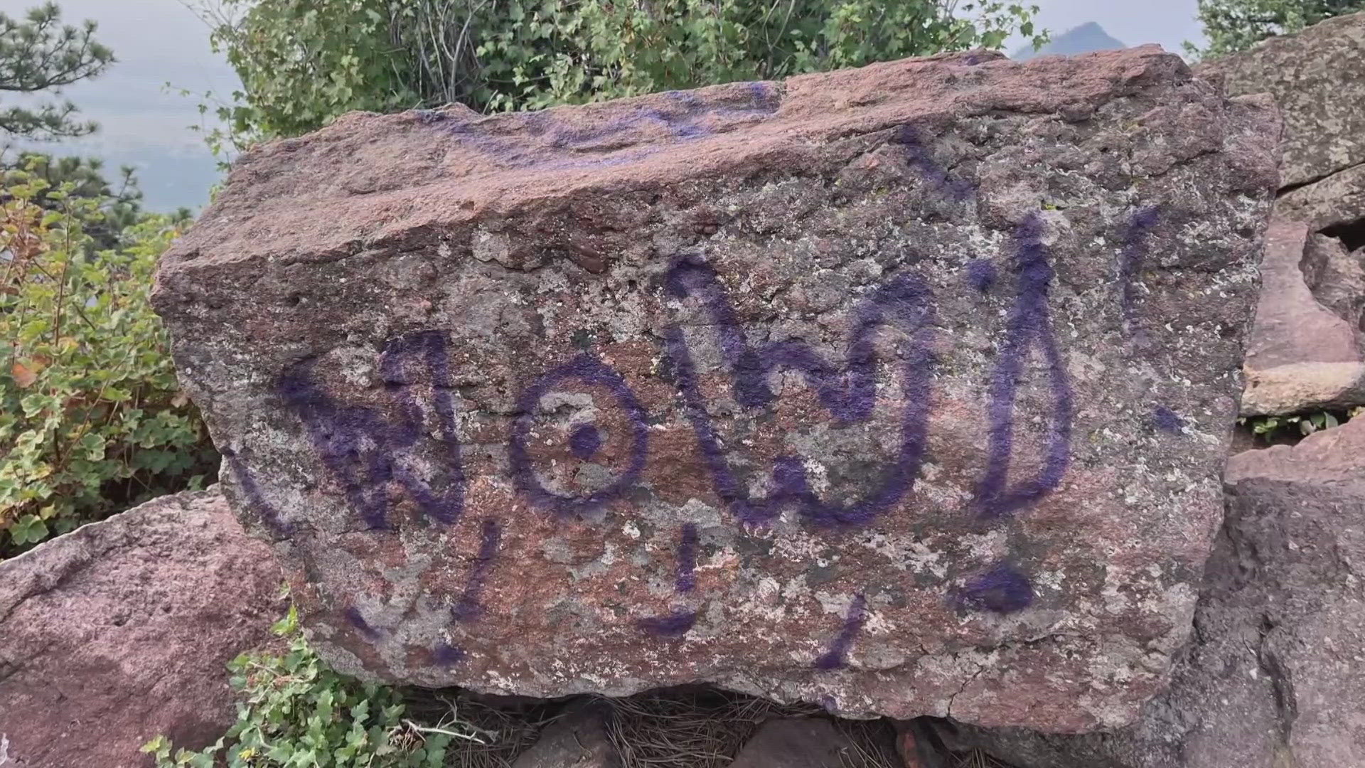 Jeff Valliere, a local hiker, found 11 different spots with graffiti on the trail on Green Mountain in Boulder Tuesday morning.