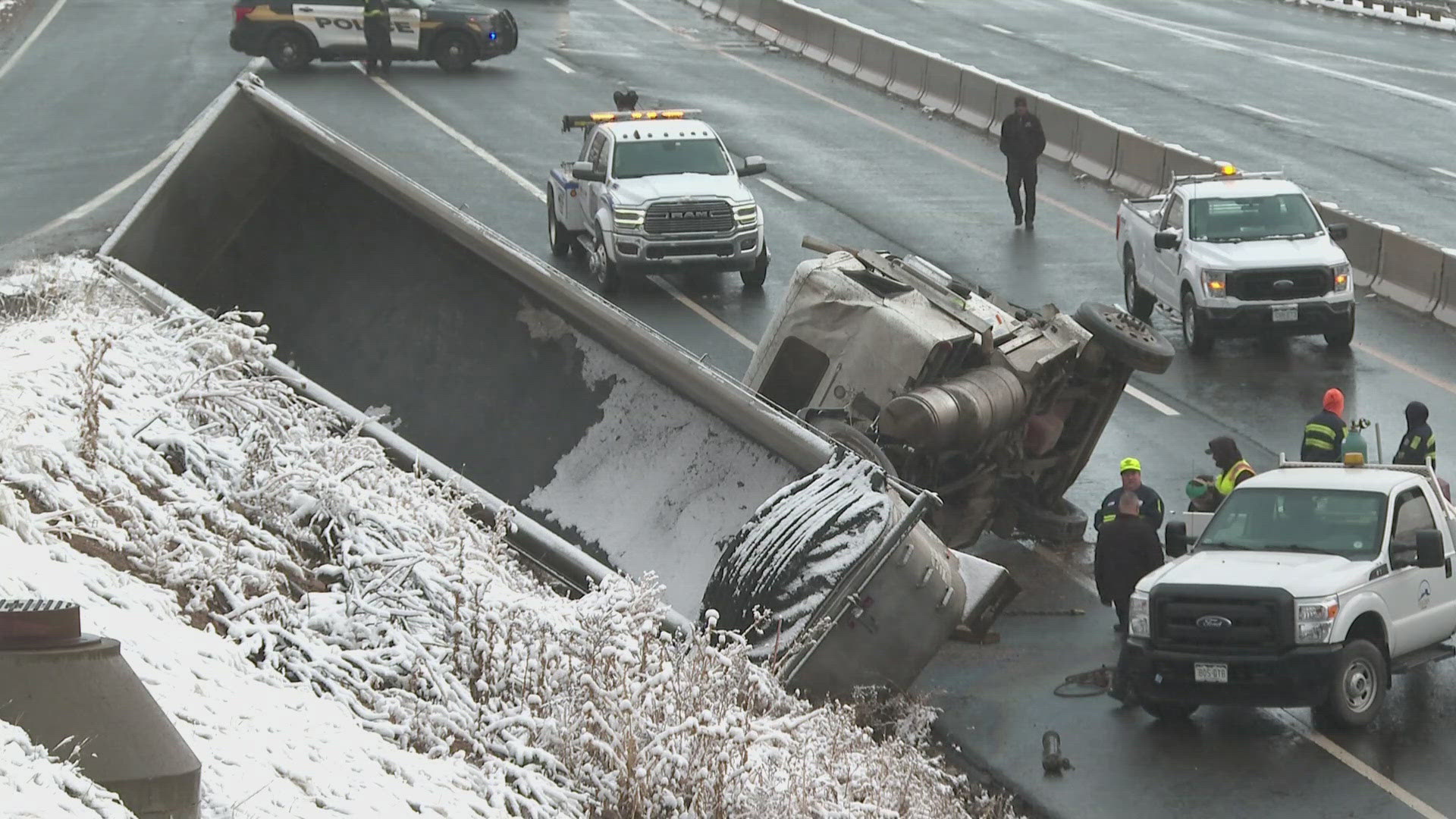 The officer was responding to an overturned tractor trailer in the westbound lanes of Highway 58 just east of Washington Avenue.