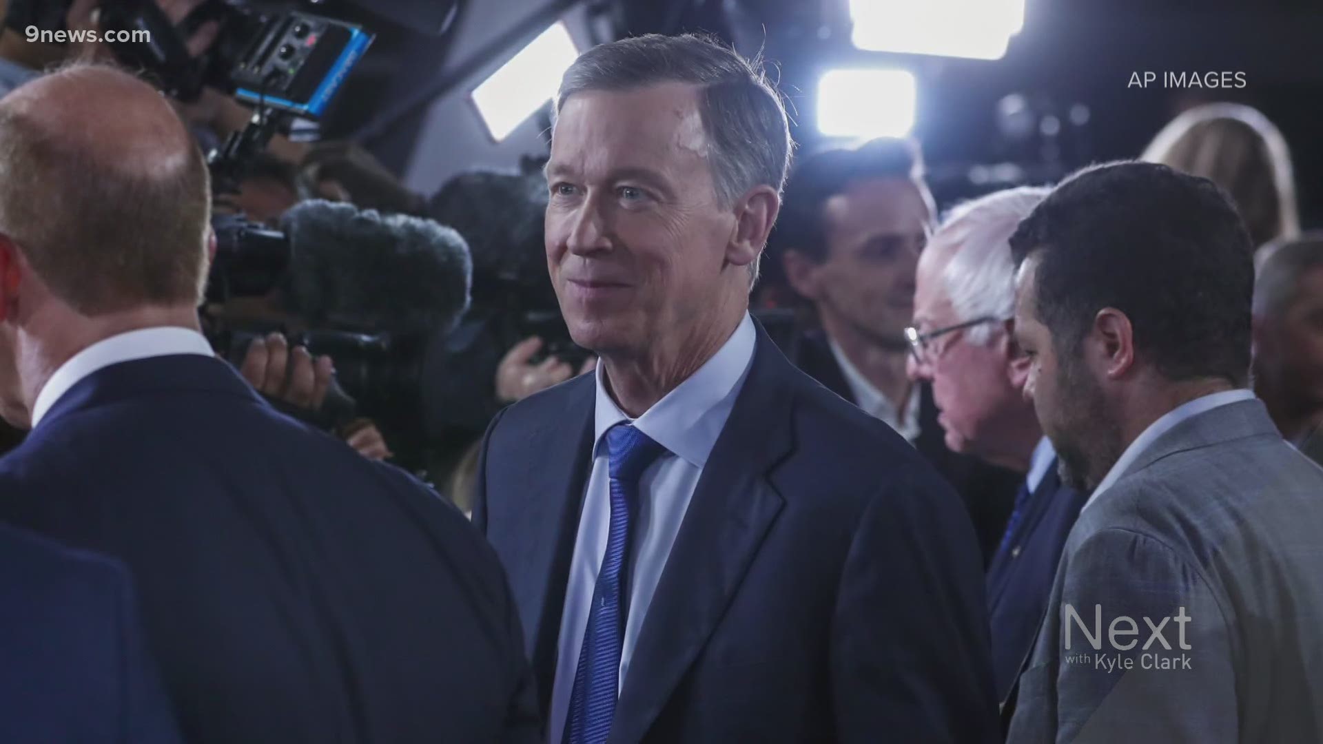 Former Governor John Hickenlooper has been told to appear at a video ethics hearing.
