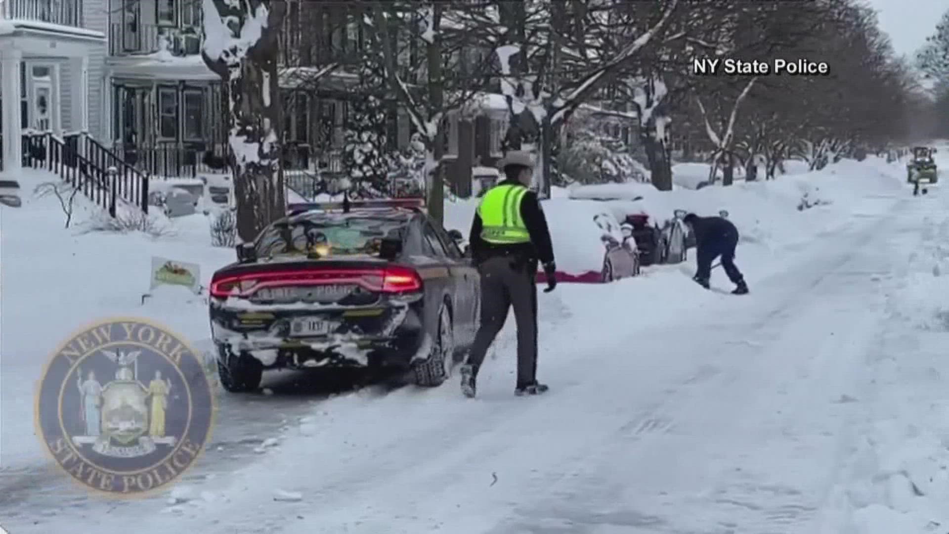 Buffalo residents searched for cars buried in snow drifts and looked for more victims Monday, after 28 people died.