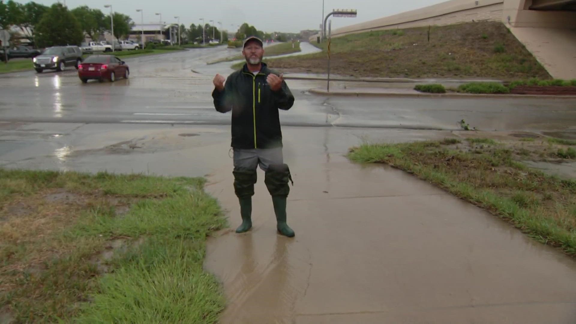 9NEWS Meteorologist Cory Reppenhagen reports from Centennial where heavy rains are causing streets to flood.