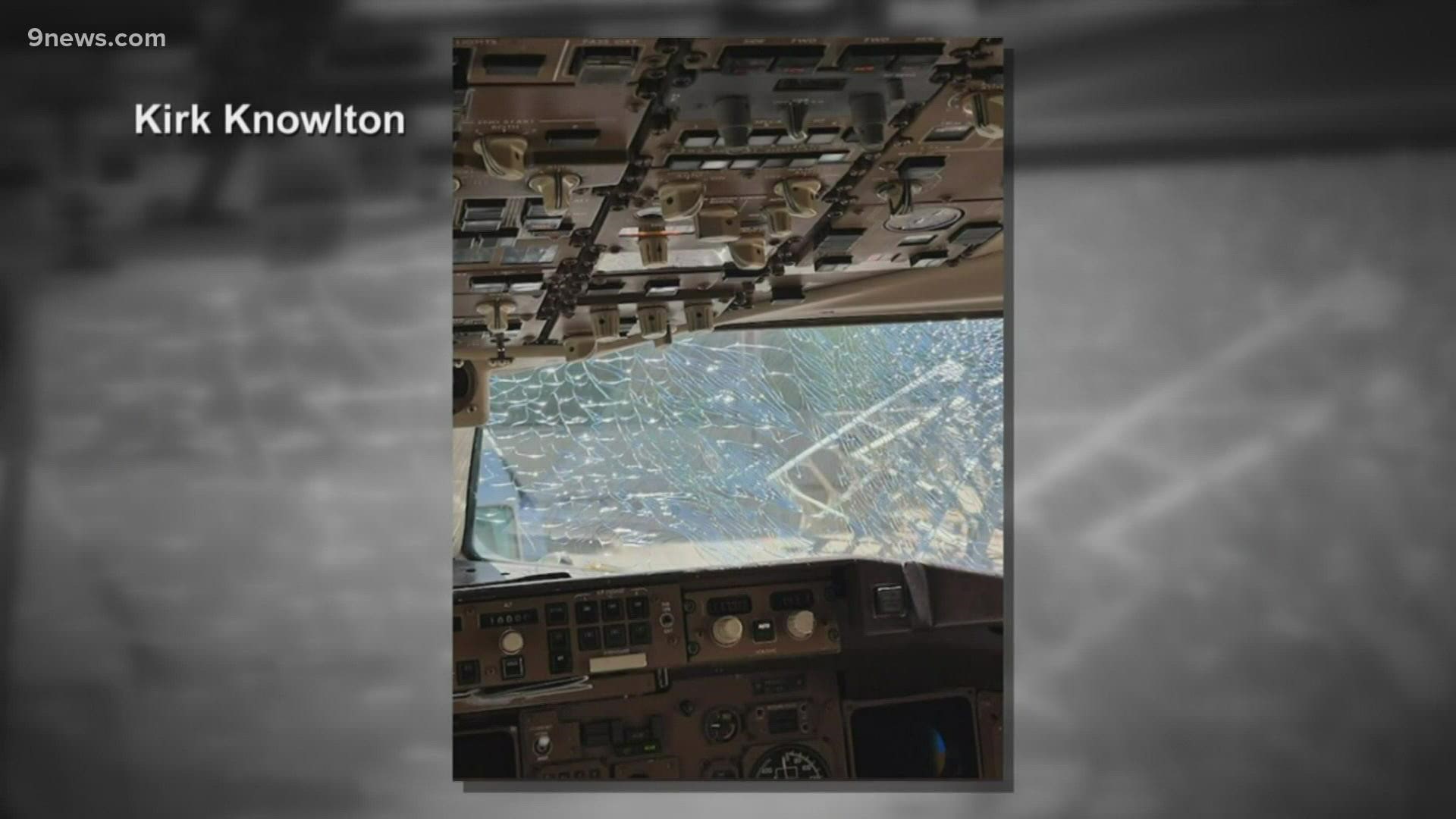 A photo of the cockpit windshield taken by a passenger shows the glass was lined with cracks but did not fall from its frame.