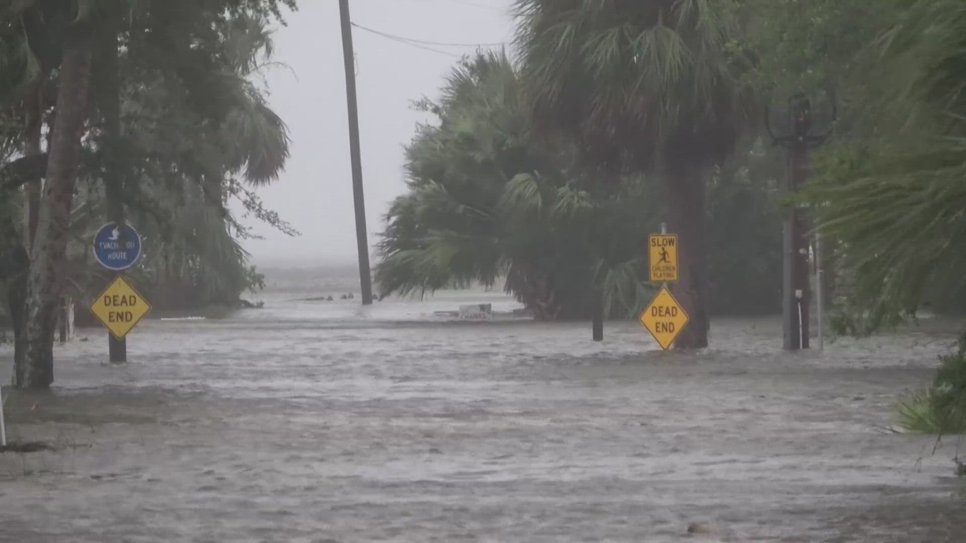 Record-setting rain from the storm that killed at least five people was causing flash flooding in Savannah, Georgia, and Charleston, South Carolina.