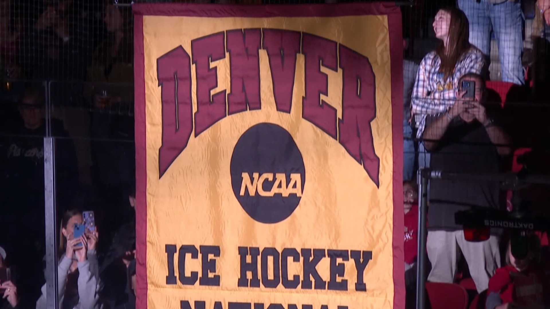 The Pioneers raised their ninth national championship banner in program history to the Magness Arena rafters Saturday night.