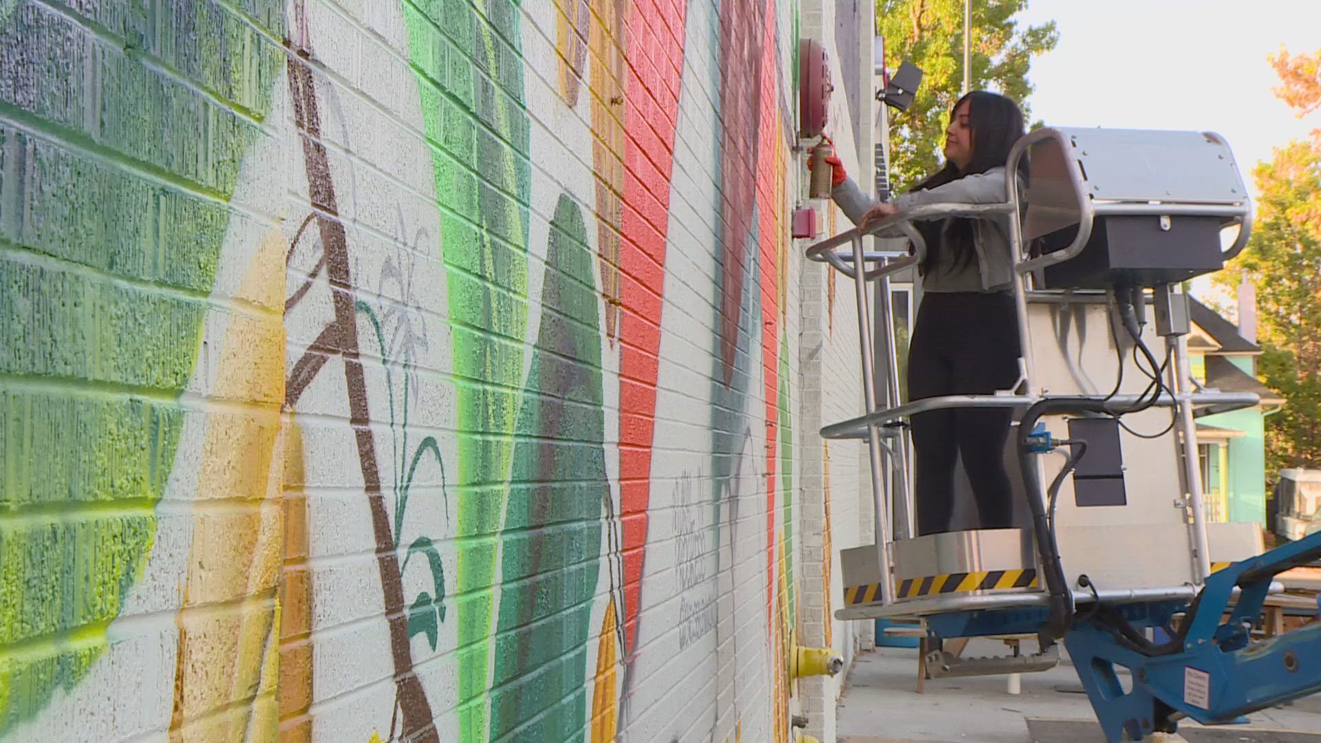 Chelsea Lewinski, local artist, is telling a story with her mural in north Denver. She wants to represents how we get our food, but how it should be done ethically.